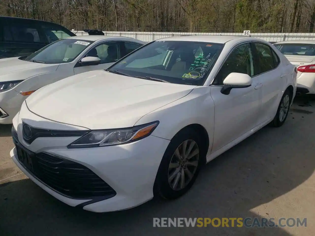 2 Photograph of a damaged car 4T1B11HK1KU256950 TOYOTA CAMRY 2019