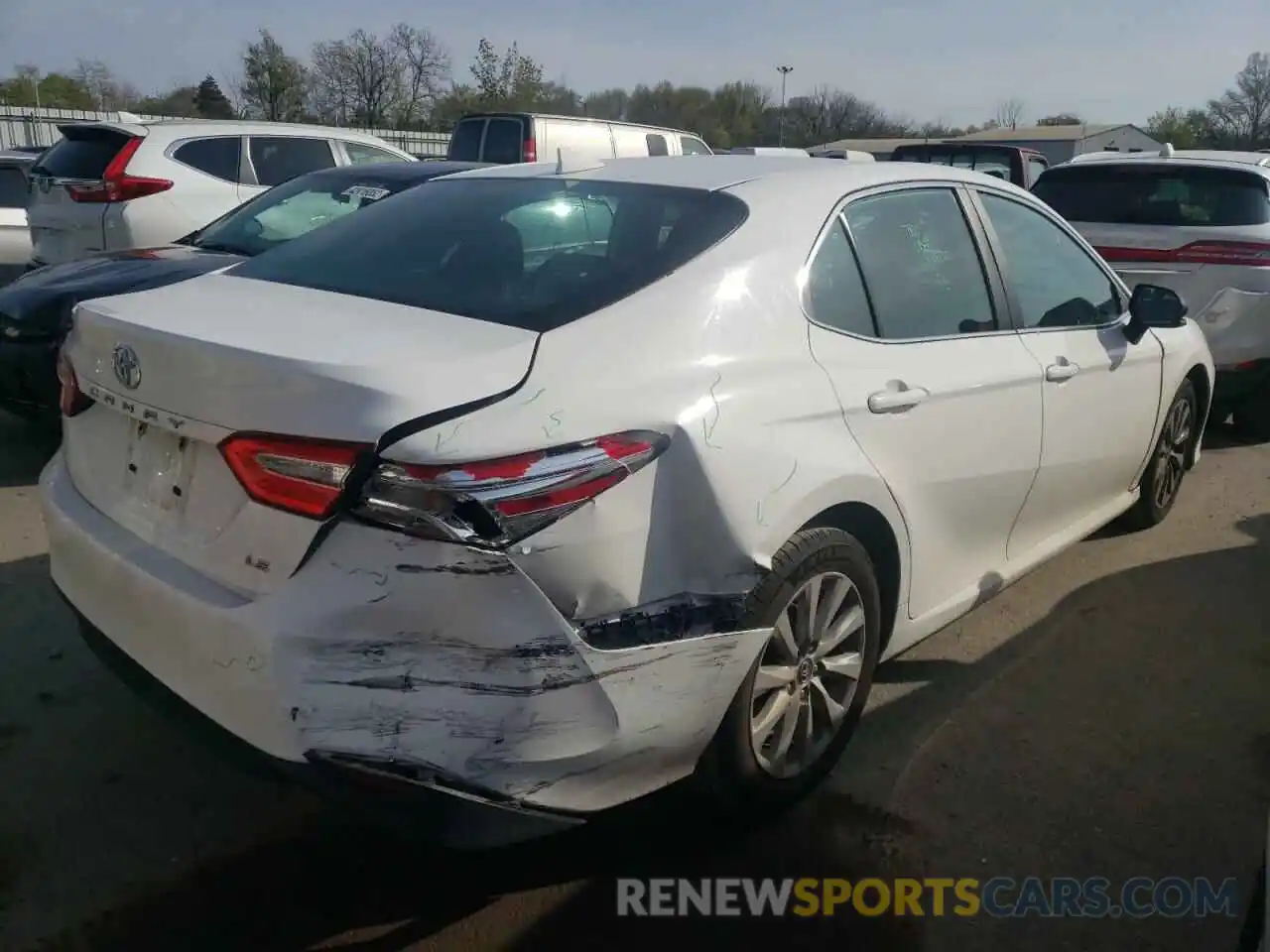 4 Photograph of a damaged car 4T1B11HK1KU256950 TOYOTA CAMRY 2019