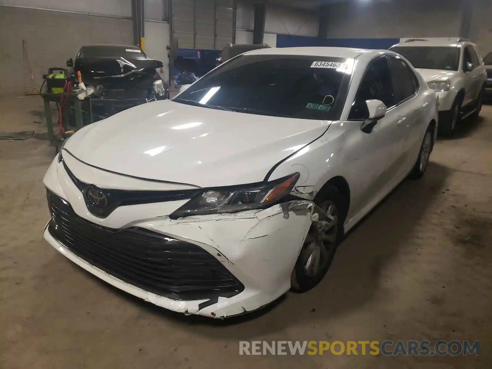 2 Photograph of a damaged car 4T1B11HK1KU257256 TOYOTA CAMRY 2019