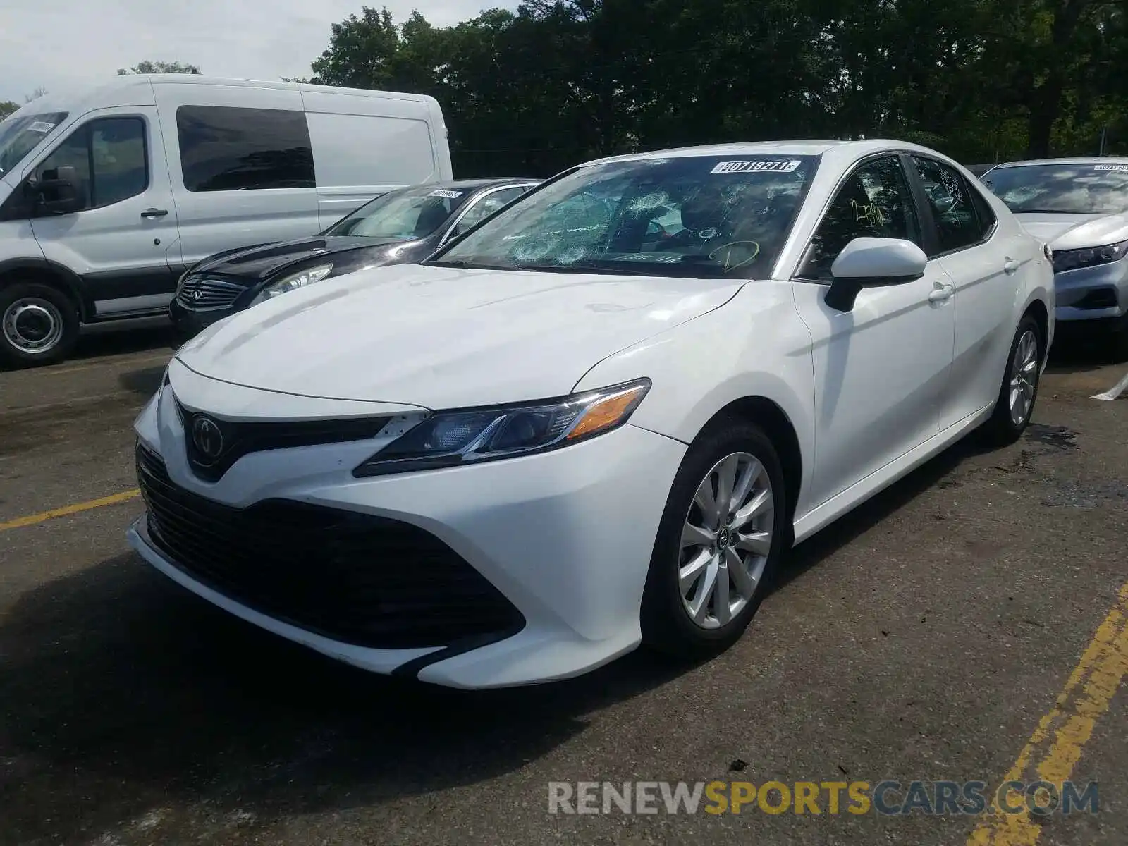 2 Photograph of a damaged car 4T1B11HK1KU257497 TOYOTA CAMRY 2019