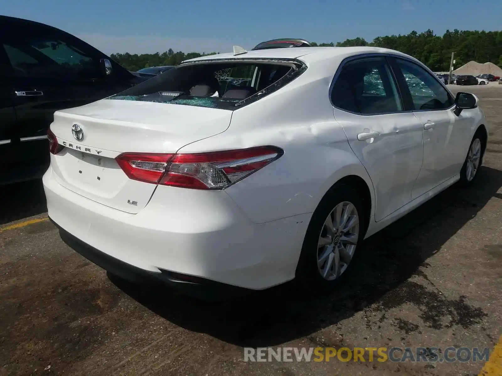 4 Photograph of a damaged car 4T1B11HK1KU257497 TOYOTA CAMRY 2019