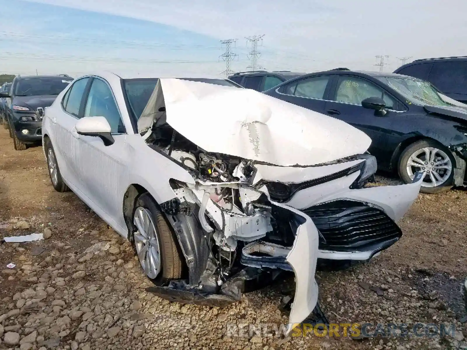 1 Photograph of a damaged car 4T1B11HK1KU257614 TOYOTA CAMRY 2019