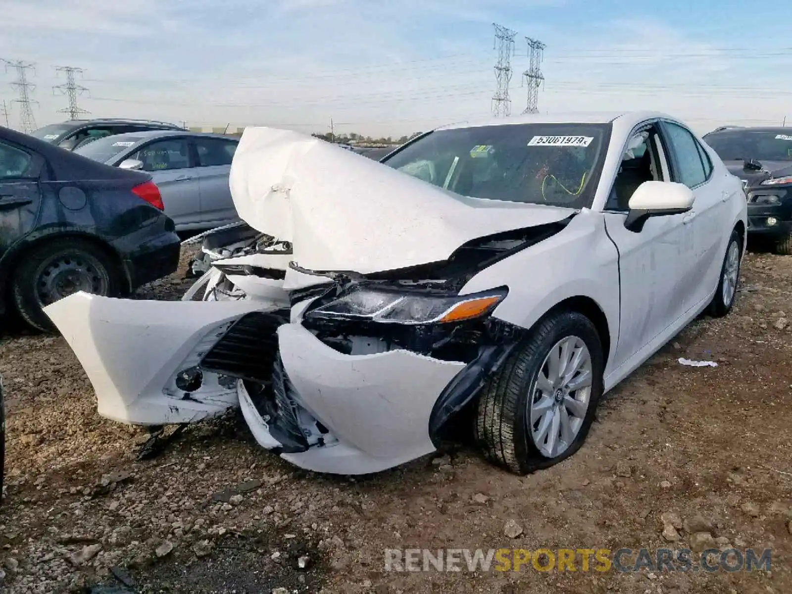 2 Photograph of a damaged car 4T1B11HK1KU257614 TOYOTA CAMRY 2019