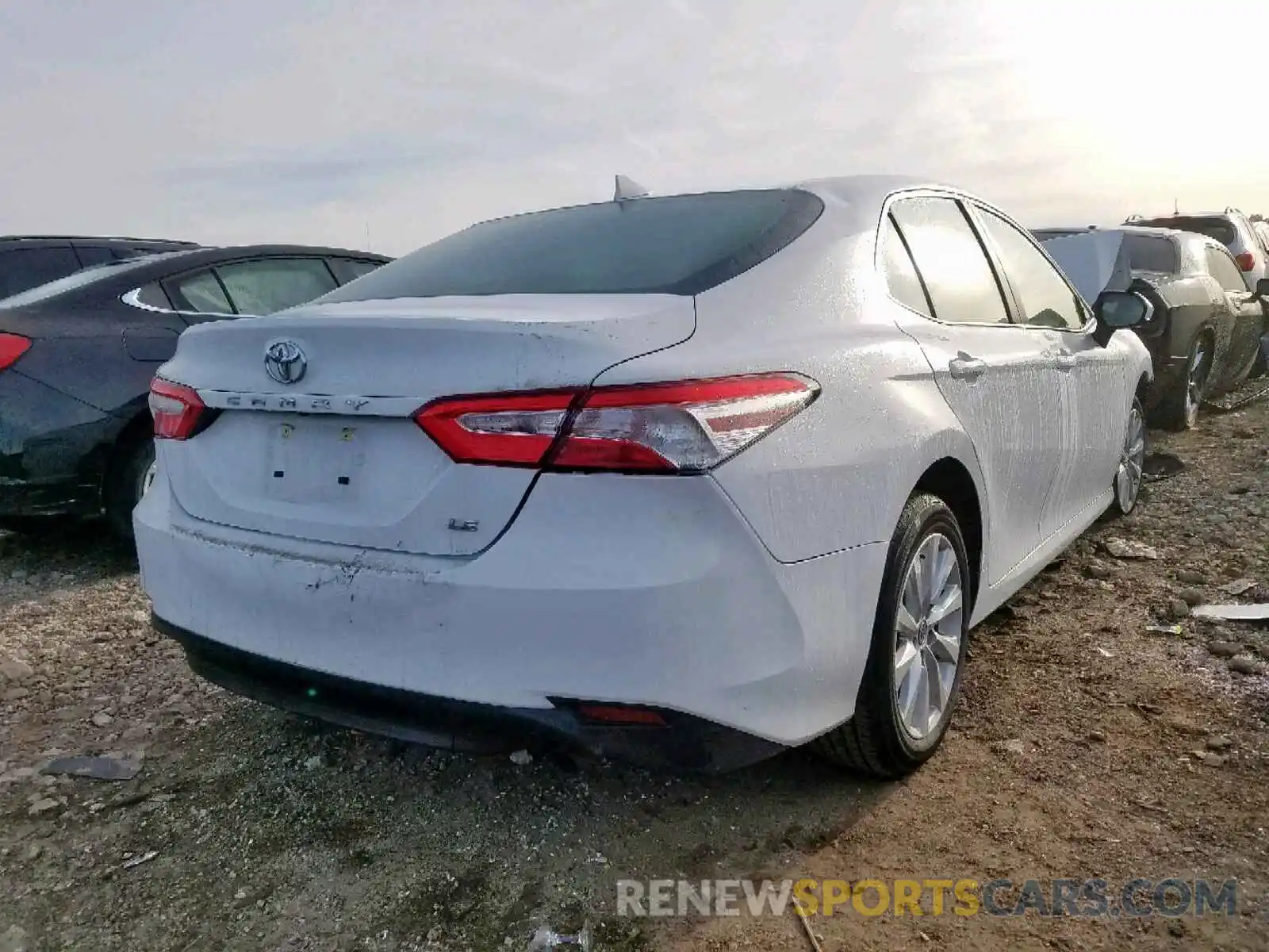 4 Photograph of a damaged car 4T1B11HK1KU257614 TOYOTA CAMRY 2019