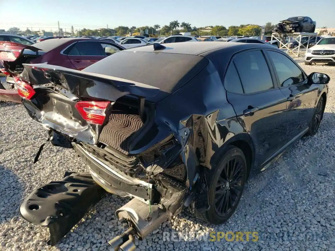 4 Photograph of a damaged car 4T1B11HK1KU258312 TOYOTA CAMRY 2019