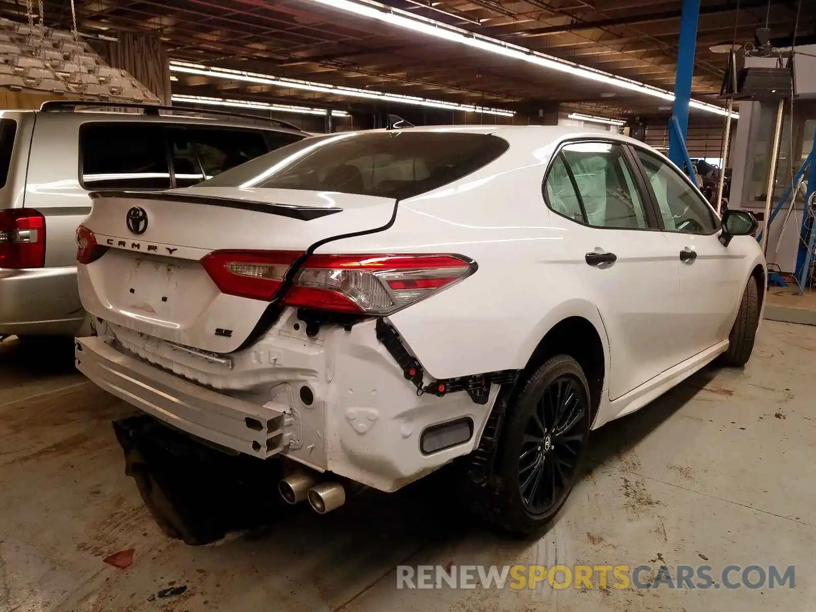 4 Photograph of a damaged car 4T1B11HK1KU259685 TOYOTA CAMRY 2019