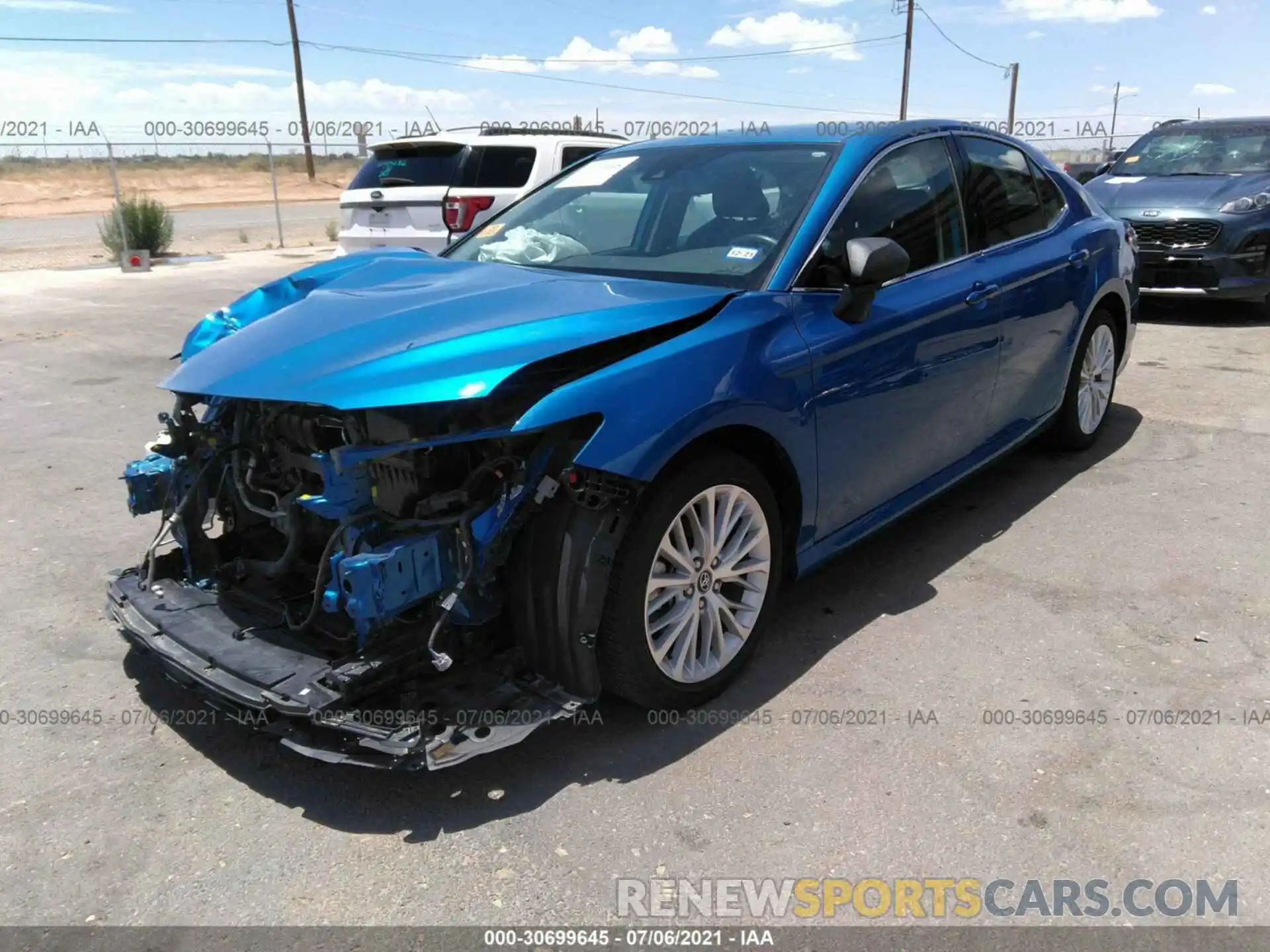 2 Photograph of a damaged car 4T1B11HK1KU259976 TOYOTA CAMRY 2019