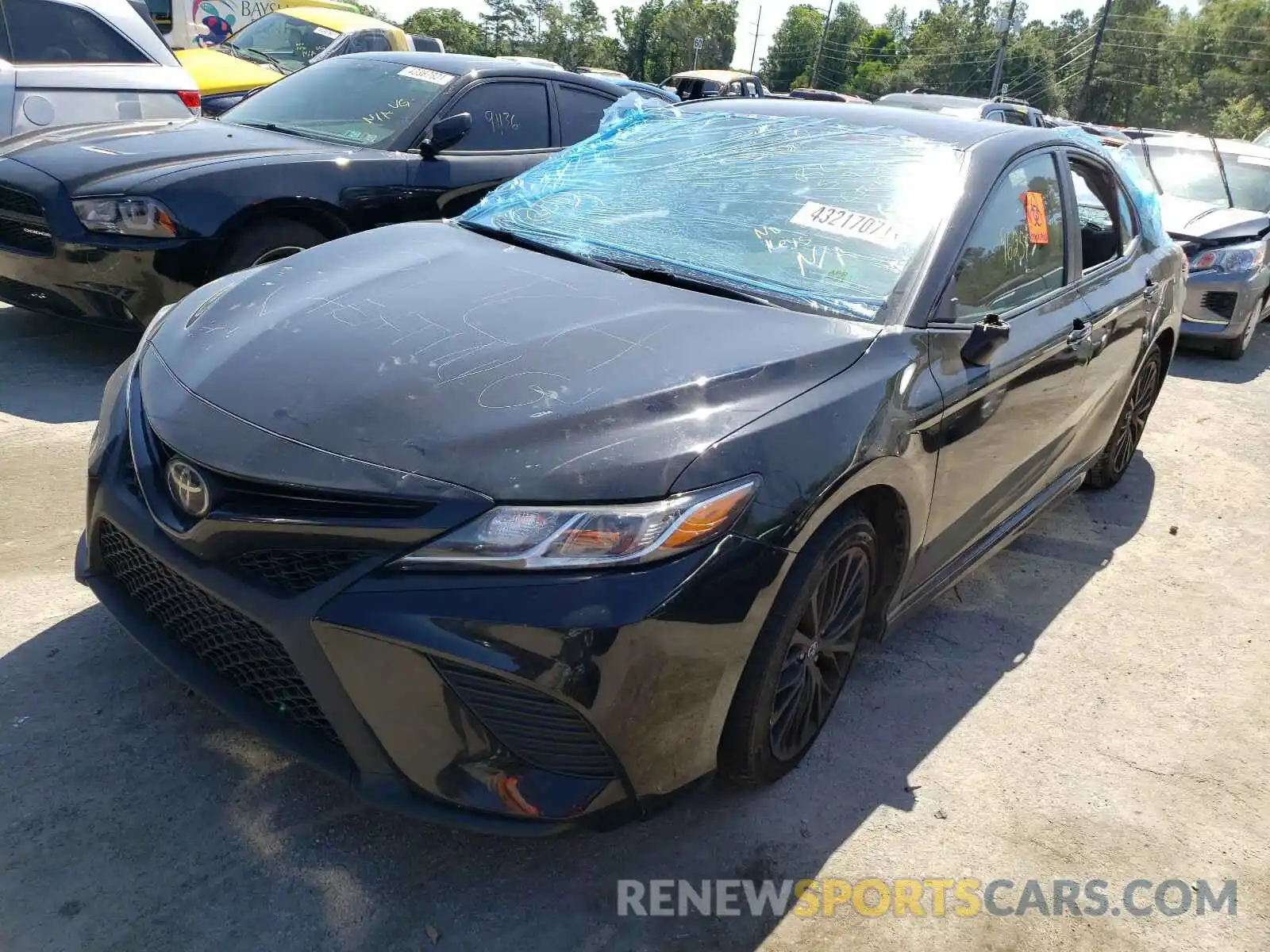 2 Photograph of a damaged car 4T1B11HK1KU260125 TOYOTA CAMRY 2019