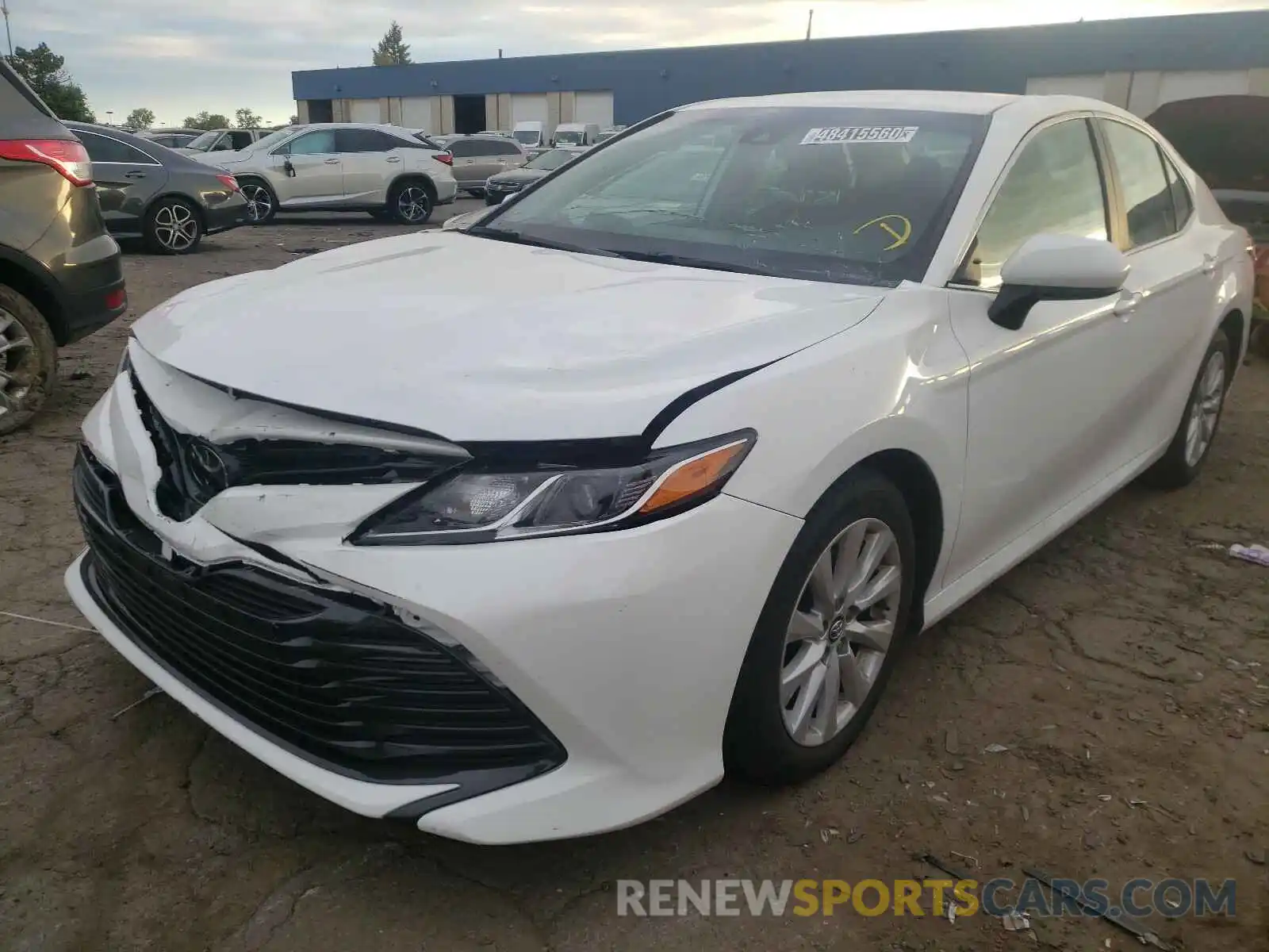 2 Photograph of a damaged car 4T1B11HK1KU264384 TOYOTA CAMRY 2019