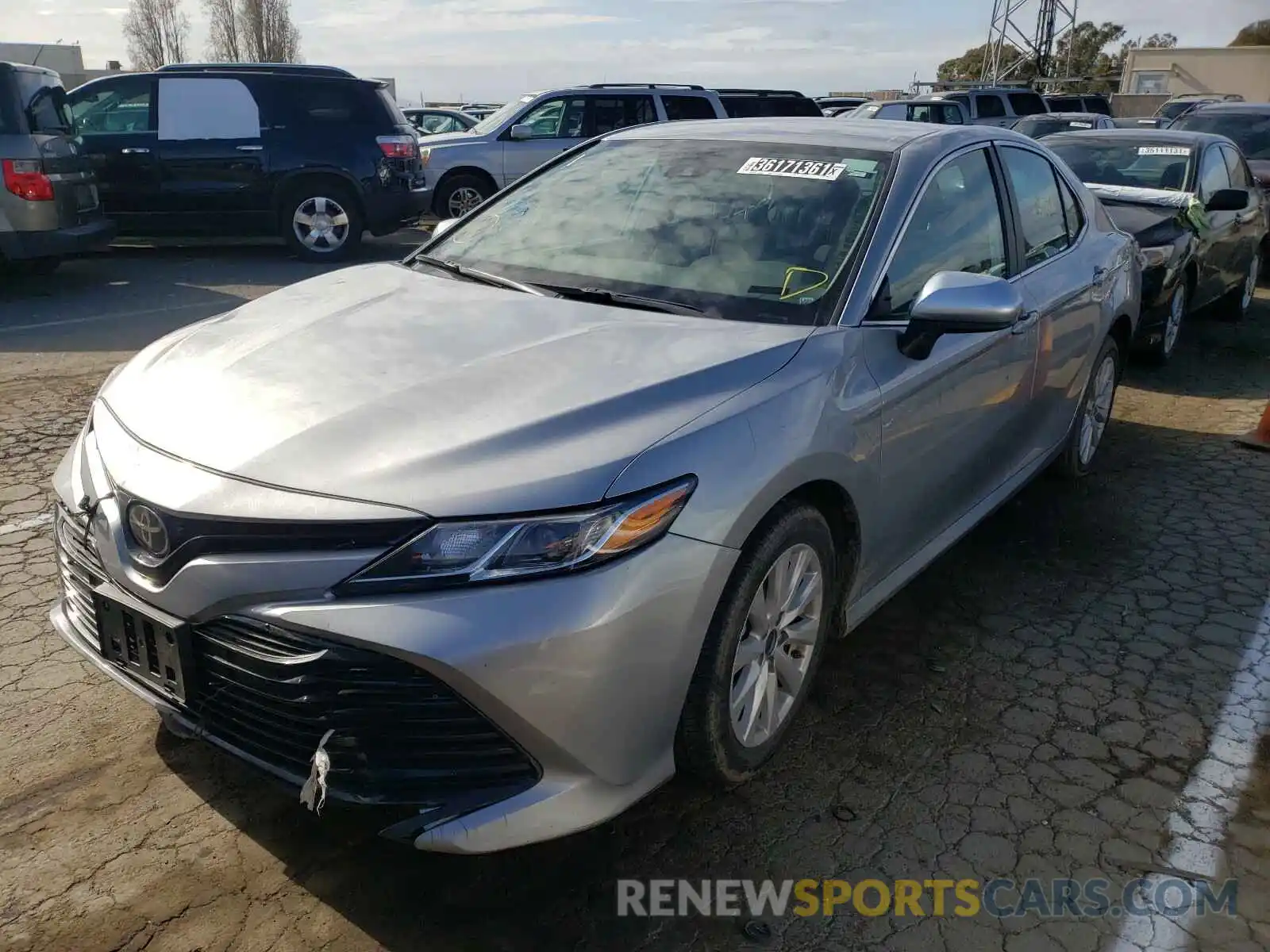 2 Photograph of a damaged car 4T1B11HK1KU266653 TOYOTA CAMRY 2019