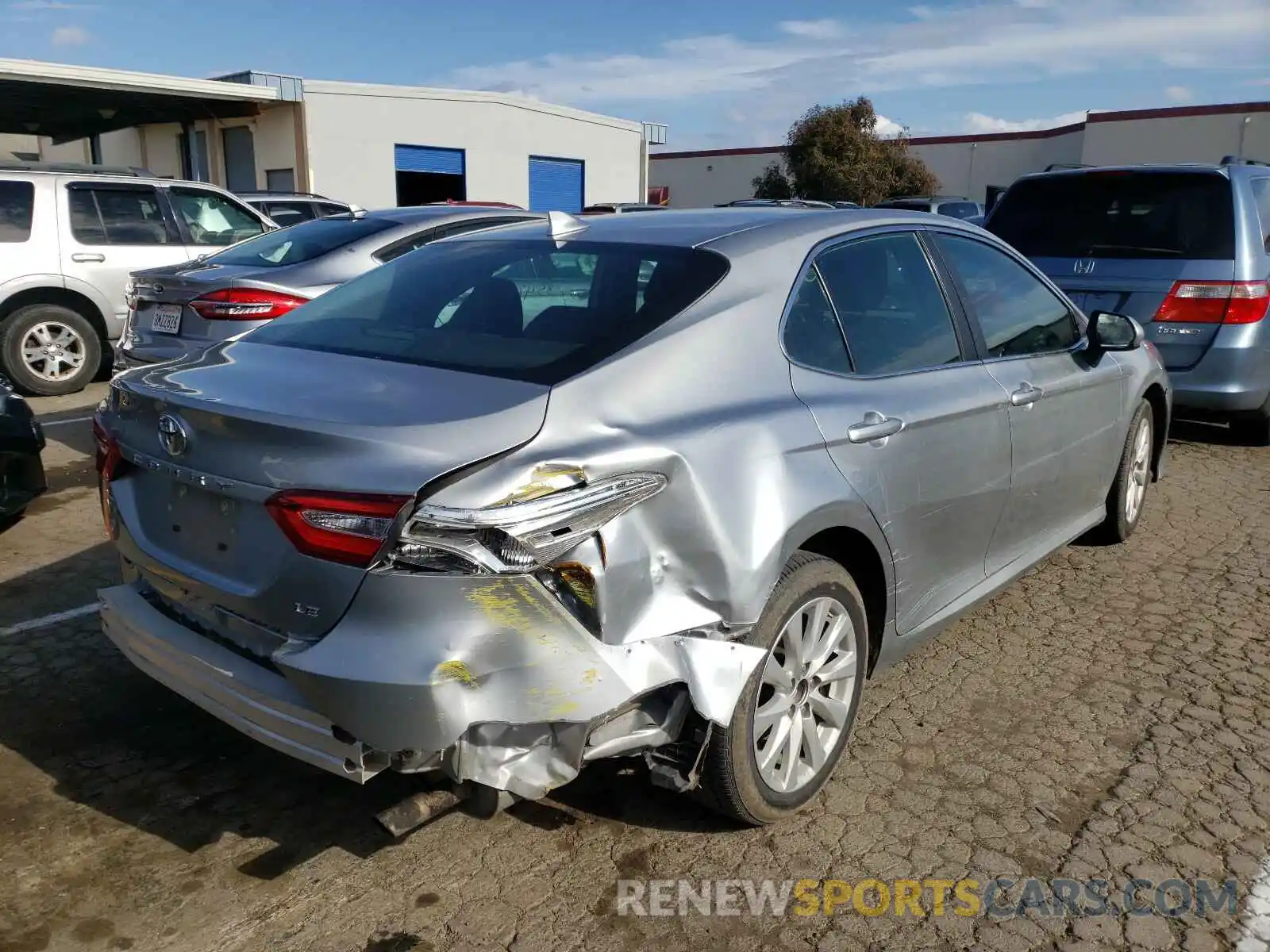 4 Photograph of a damaged car 4T1B11HK1KU266653 TOYOTA CAMRY 2019