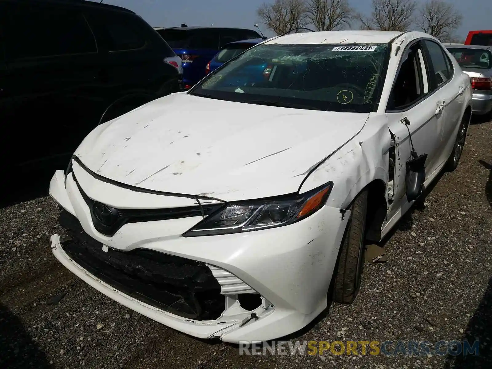 2 Photograph of a damaged car 4T1B11HK1KU267916 TOYOTA CAMRY 2019