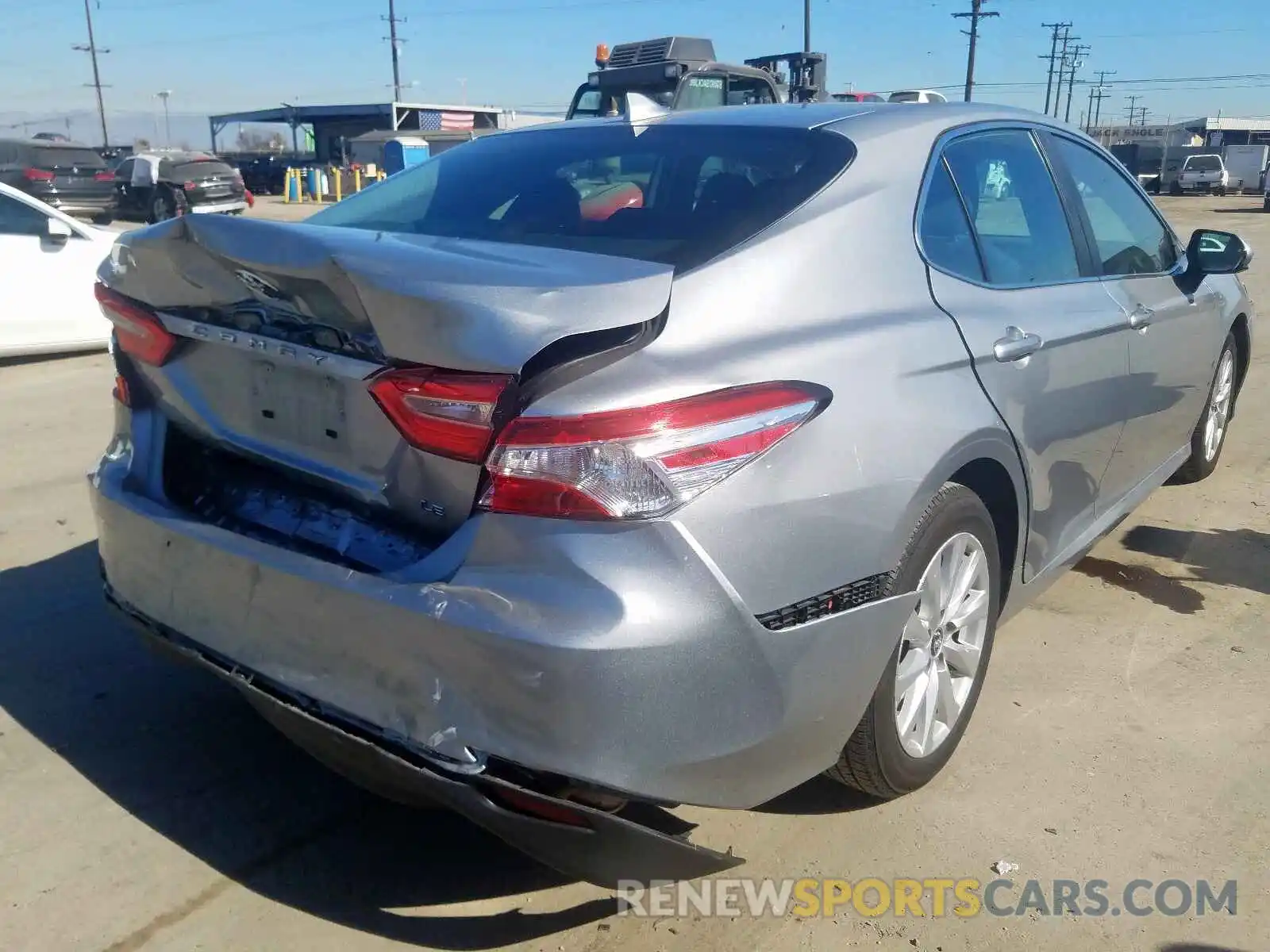 4 Photograph of a damaged car 4T1B11HK1KU269813 TOYOTA CAMRY 2019