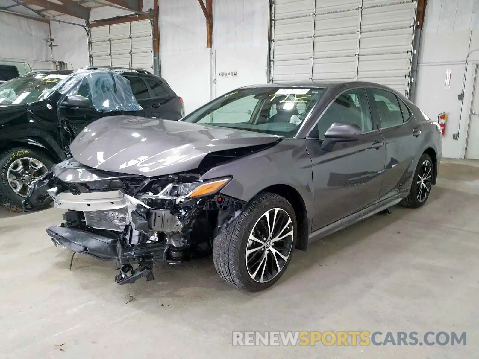 2 Photograph of a damaged car 4T1B11HK1KU271559 TOYOTA CAMRY 2019