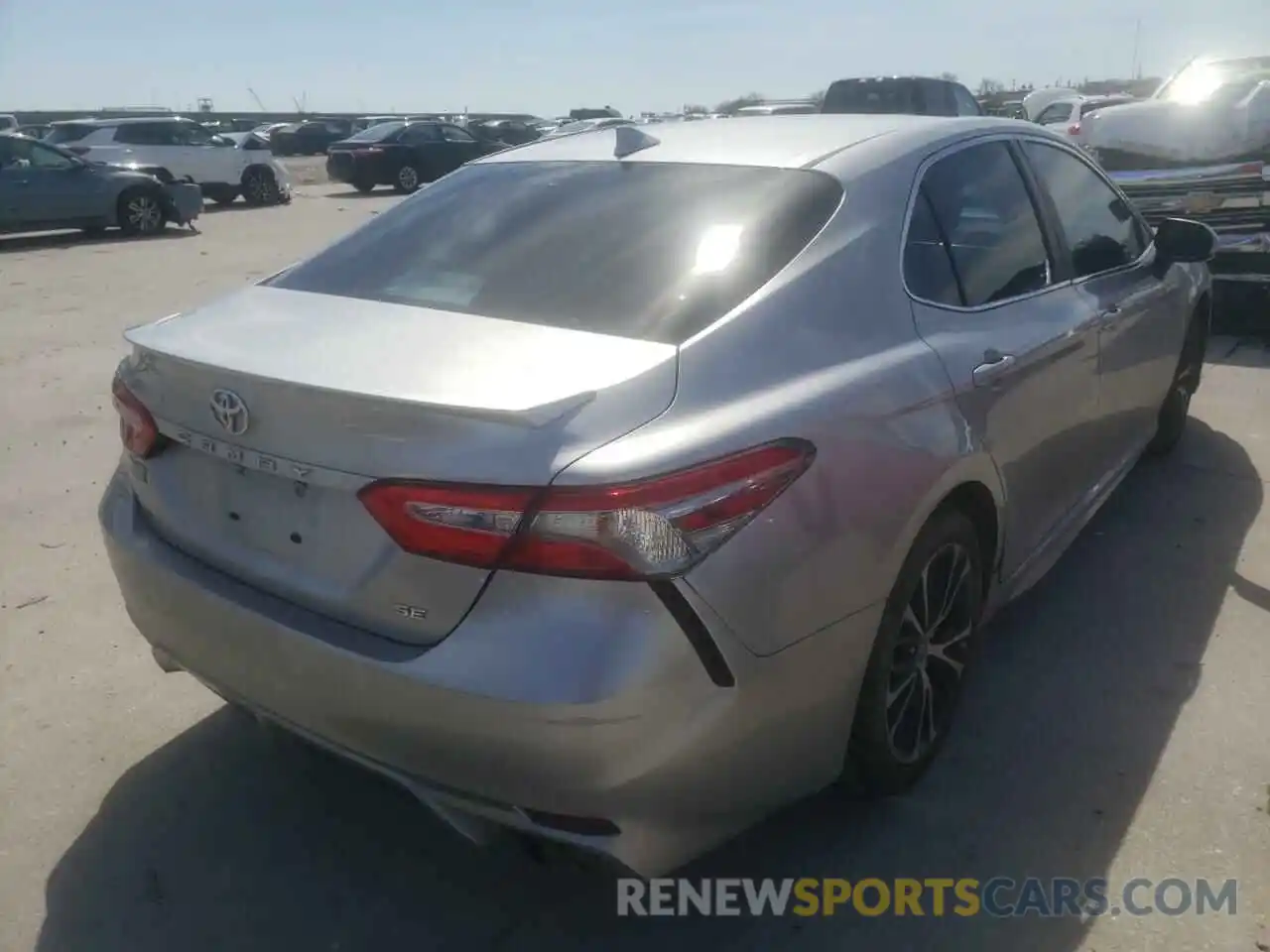 4 Photograph of a damaged car 4T1B11HK1KU272100 TOYOTA CAMRY 2019