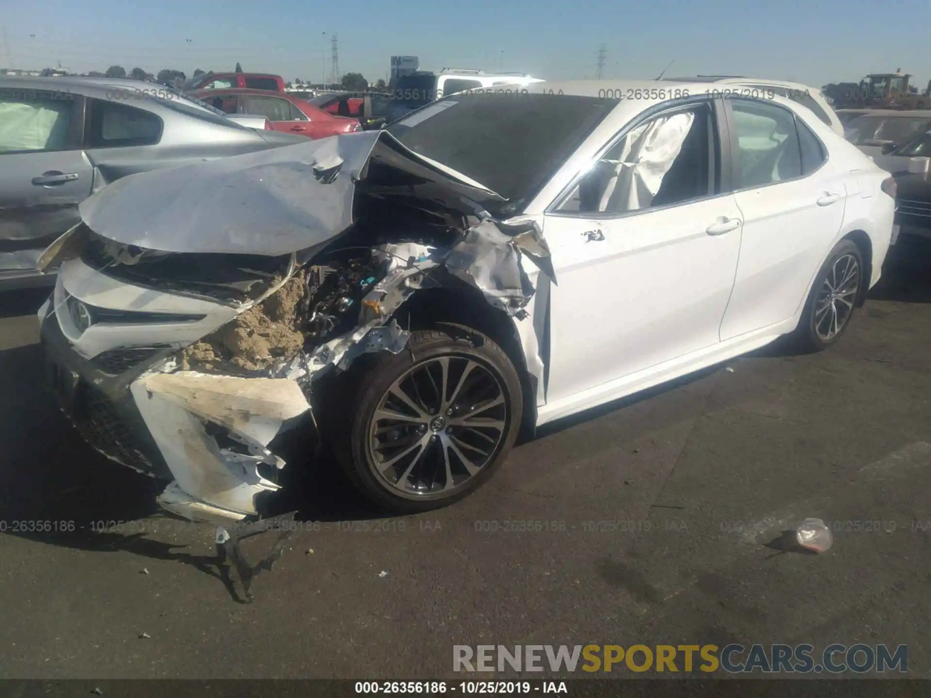 2 Photograph of a damaged car 4T1B11HK1KU272498 TOYOTA CAMRY 2019