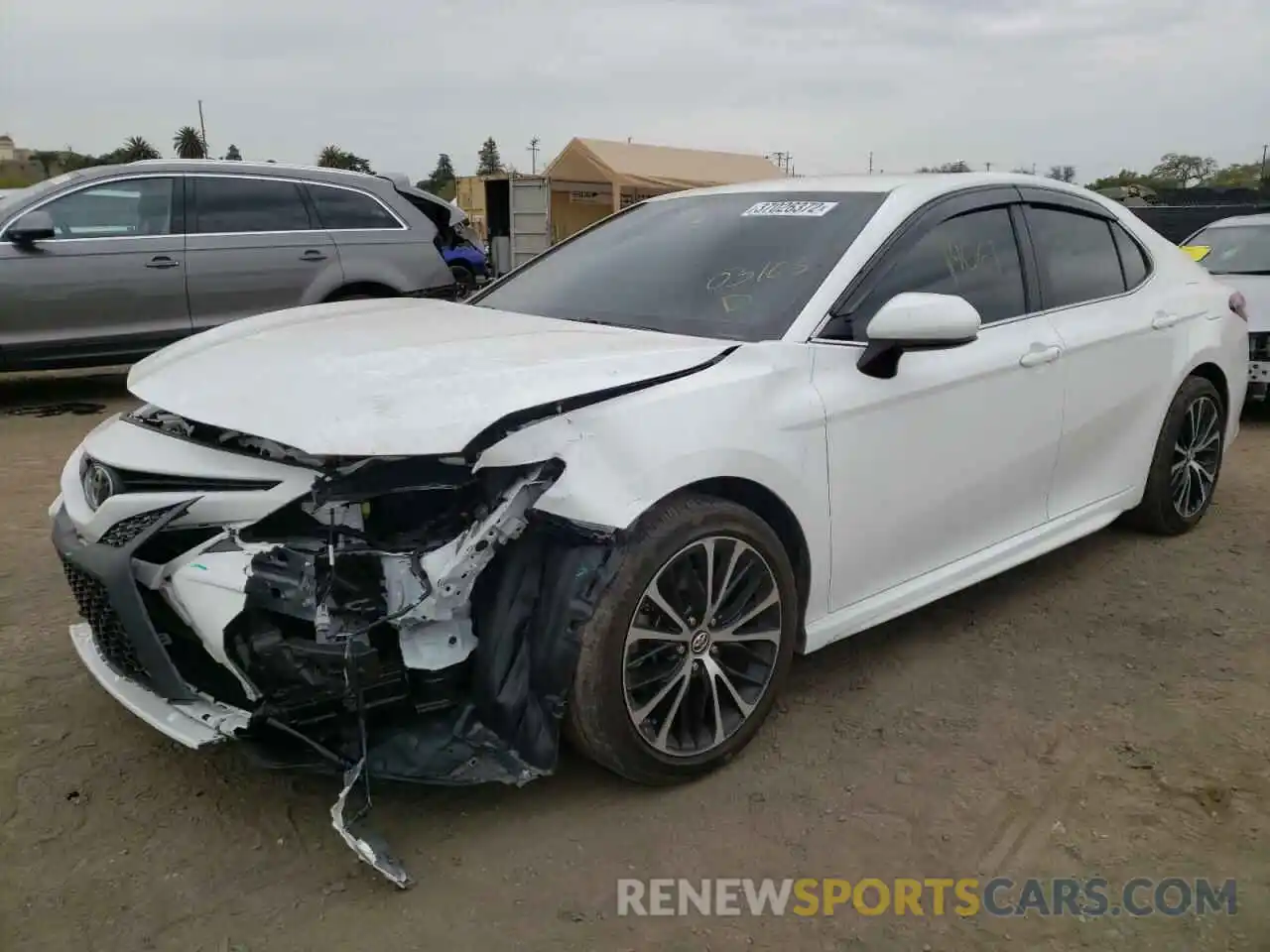 2 Photograph of a damaged car 4T1B11HK1KU272534 TOYOTA CAMRY 2019