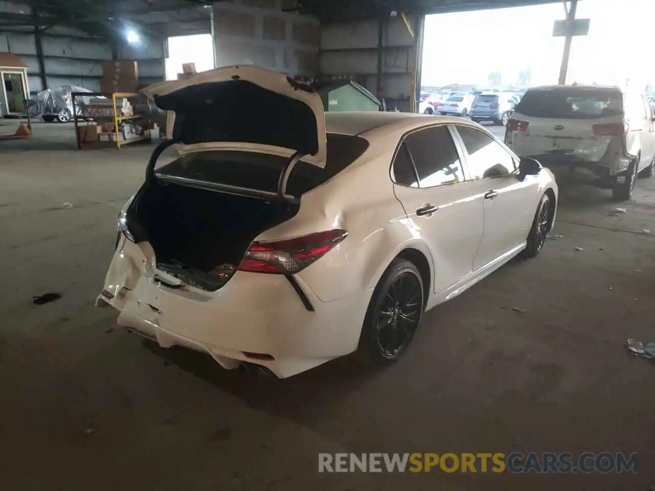 4 Photograph of a damaged car 4T1B11HK1KU273361 TOYOTA CAMRY 2019