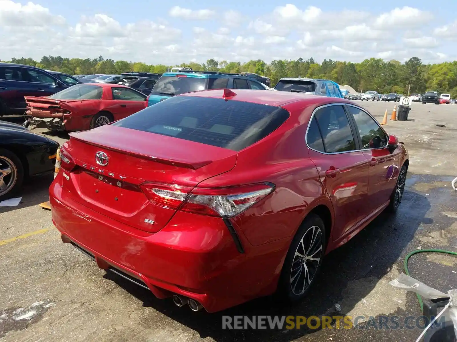 4 Photograph of a damaged car 4T1B11HK1KU275918 TOYOTA CAMRY 2019