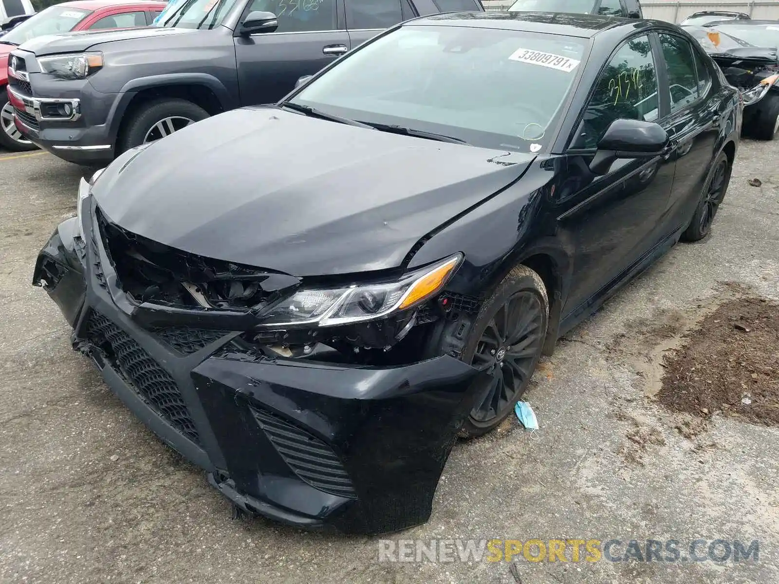 2 Photograph of a damaged car 4T1B11HK1KU284201 TOYOTA CAMRY 2019