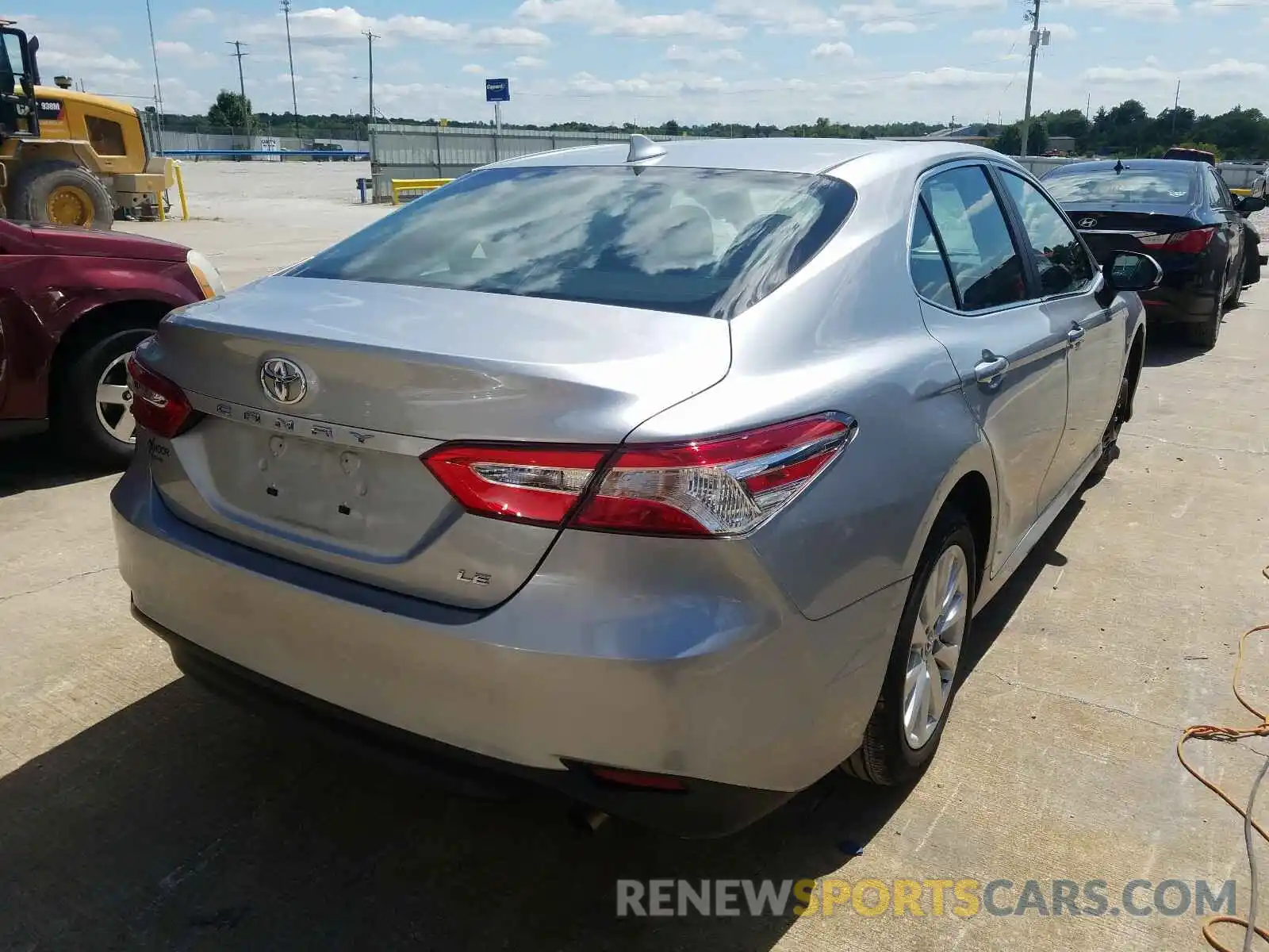 4 Photograph of a damaged car 4T1B11HK1KU284425 TOYOTA CAMRY 2019