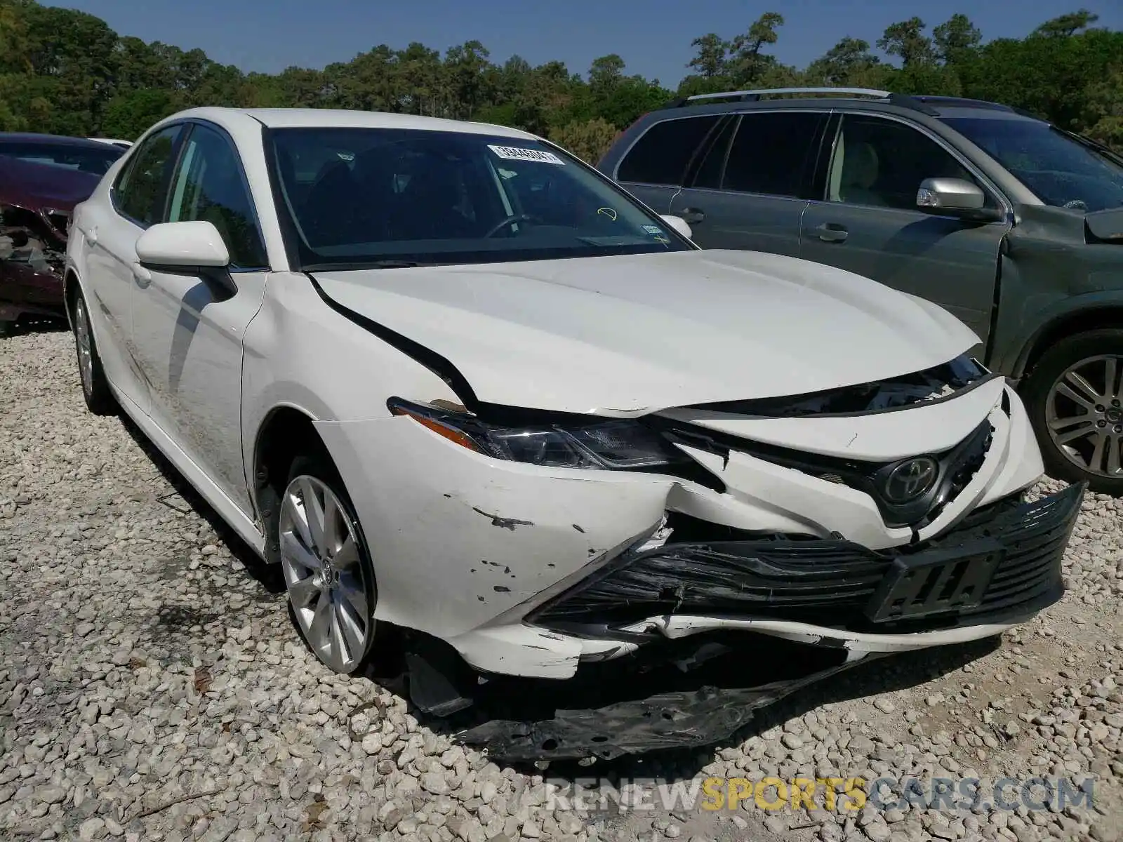 1 Photograph of a damaged car 4T1B11HK1KU285431 TOYOTA CAMRY 2019