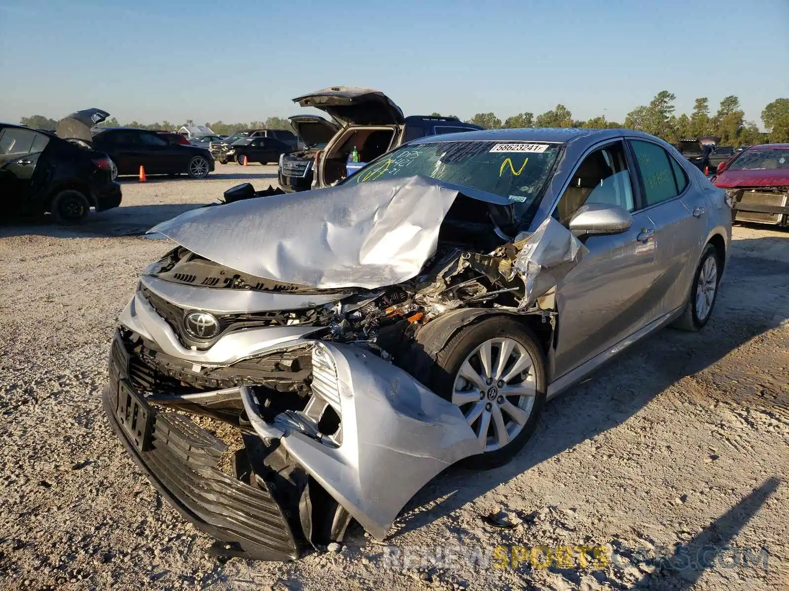 2 Photograph of a damaged car 4T1B11HK1KU287213 TOYOTA CAMRY 2019