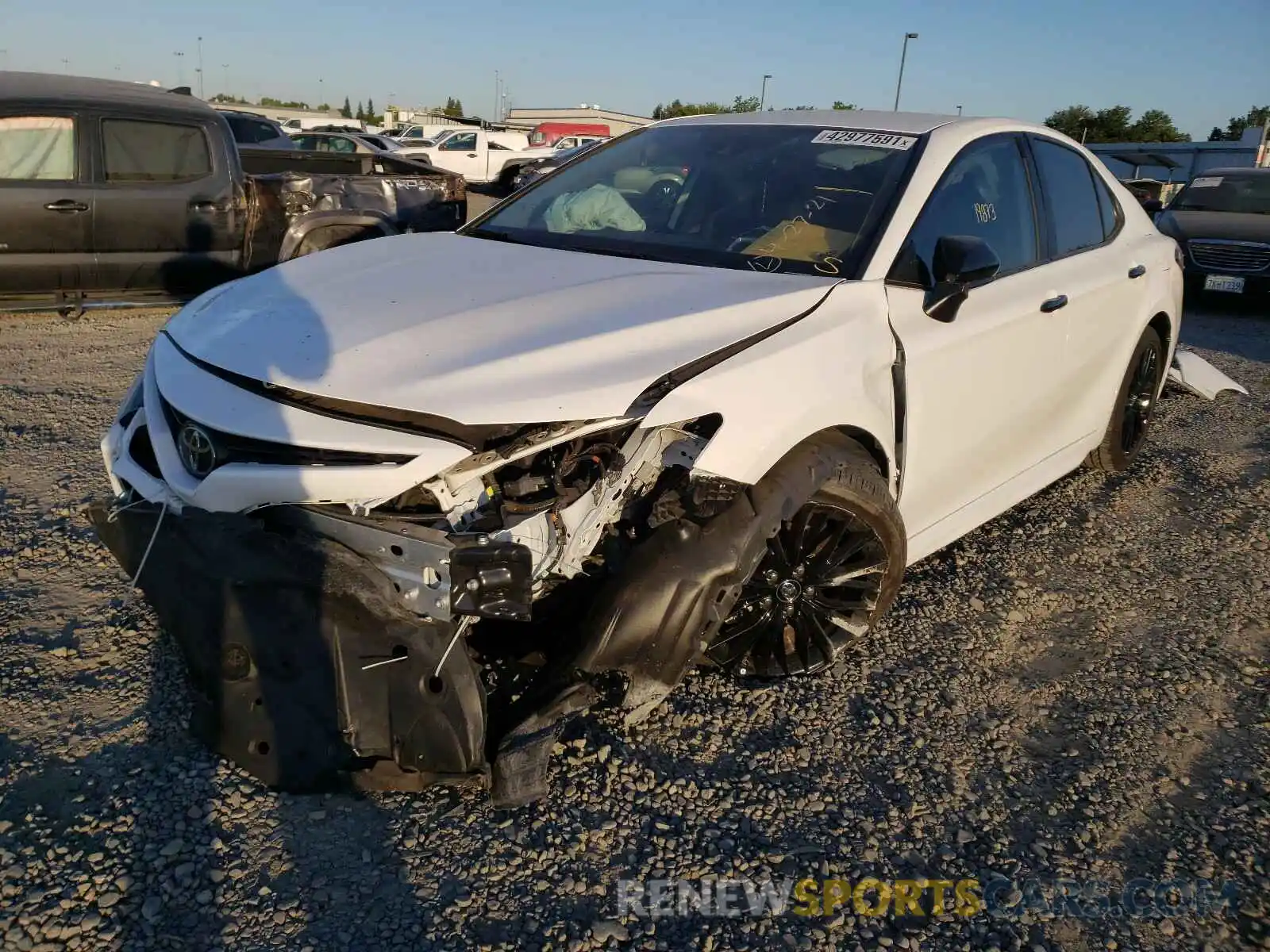 2 Photograph of a damaged car 4T1B11HK1KU288345 TOYOTA CAMRY 2019