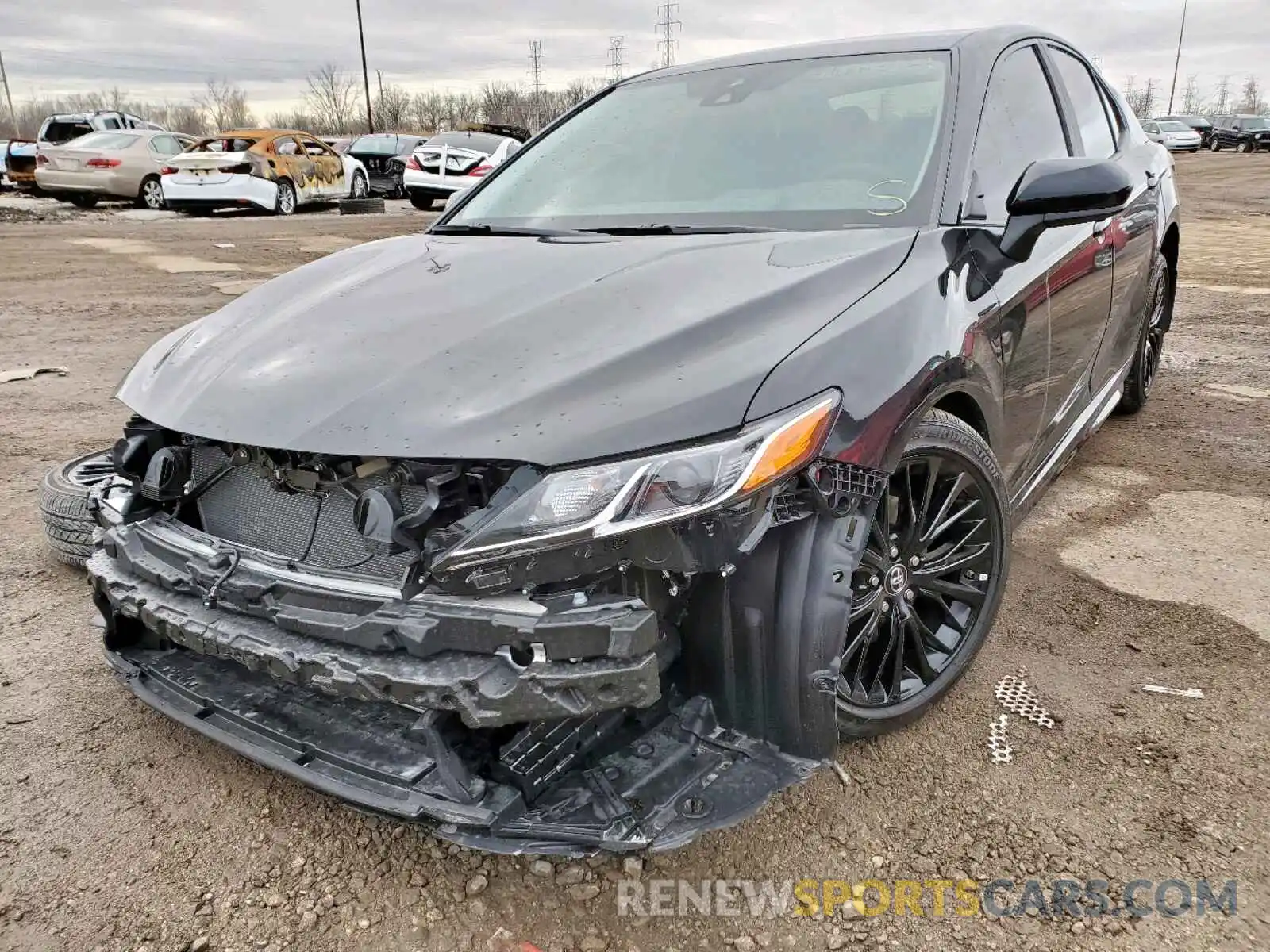 2 Photograph of a damaged car 4T1B11HK1KU290208 TOYOTA CAMRY 2019