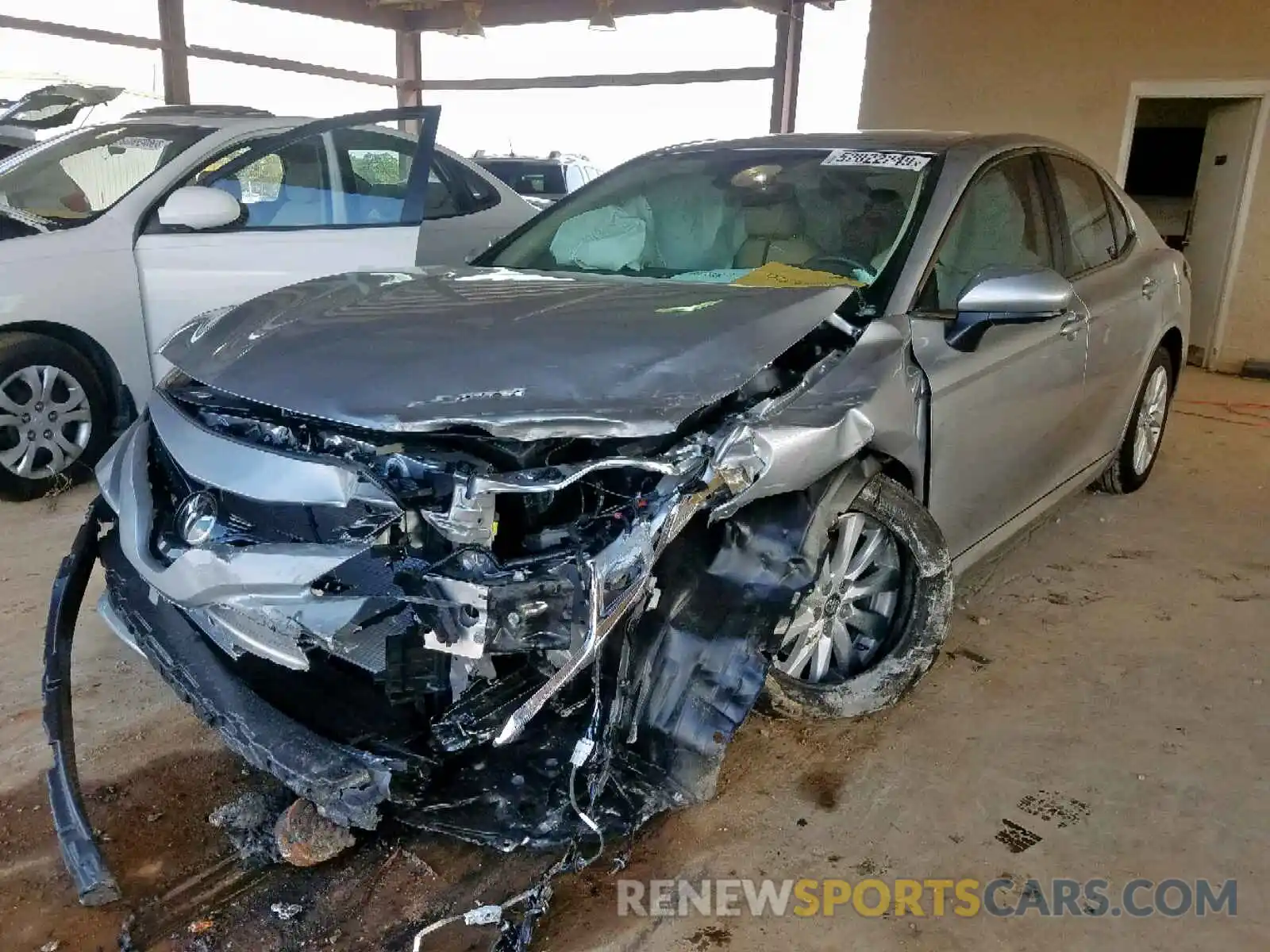 2 Photograph of a damaged car 4T1B11HK1KU291410 TOYOTA CAMRY 2019