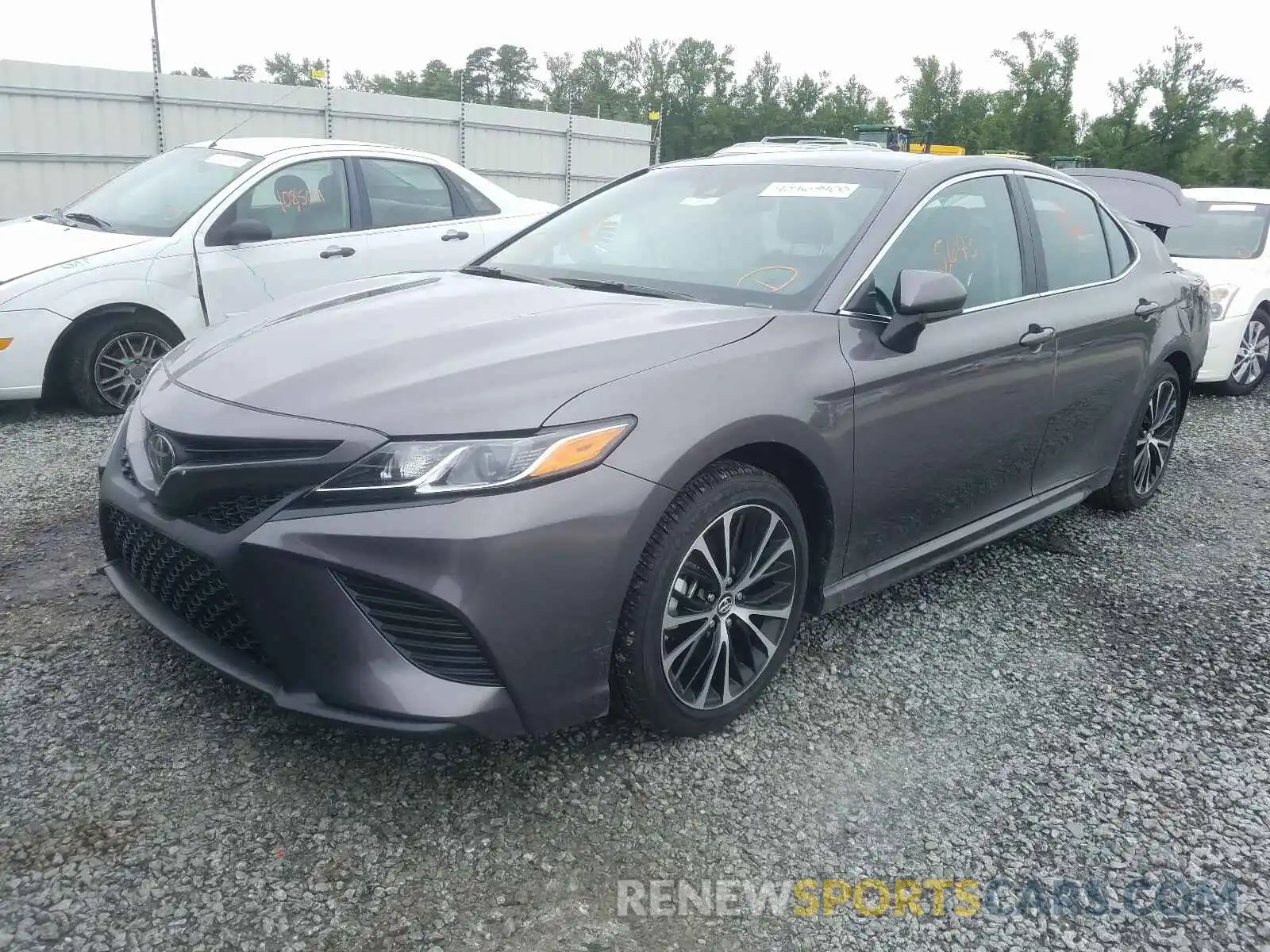 2 Photograph of a damaged car 4T1B11HK1KU297577 TOYOTA CAMRY 2019