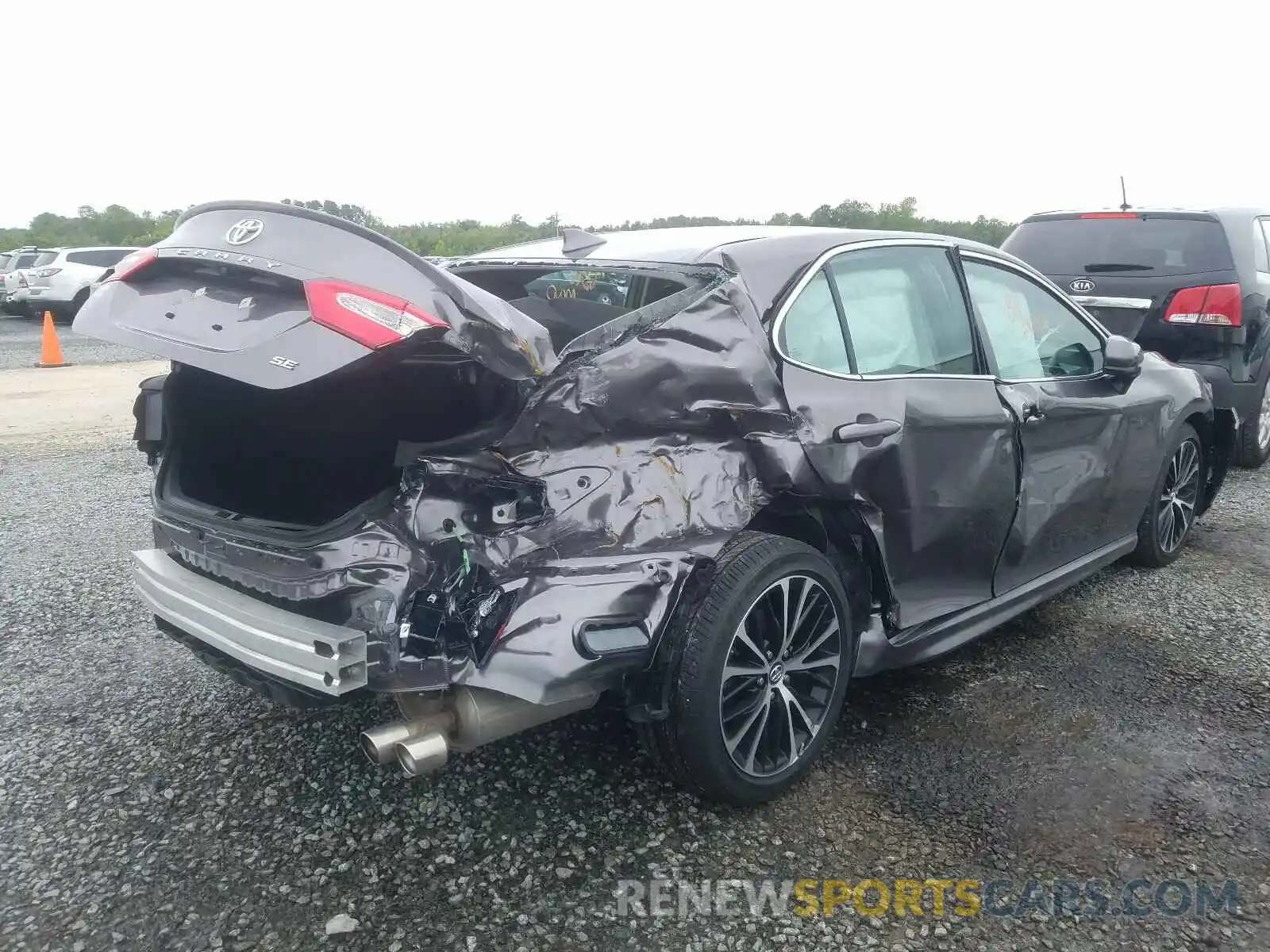 4 Photograph of a damaged car 4T1B11HK1KU297577 TOYOTA CAMRY 2019