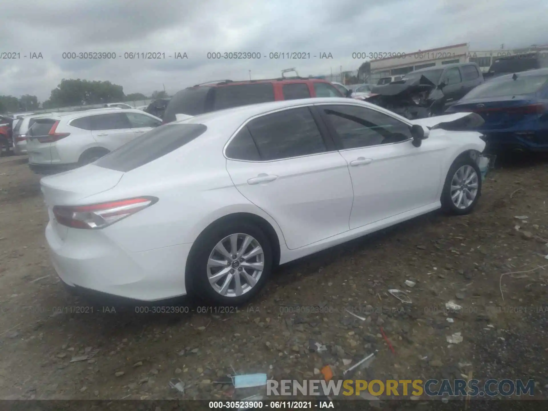 4 Photograph of a damaged car 4T1B11HK1KU680998 TOYOTA CAMRY 2019