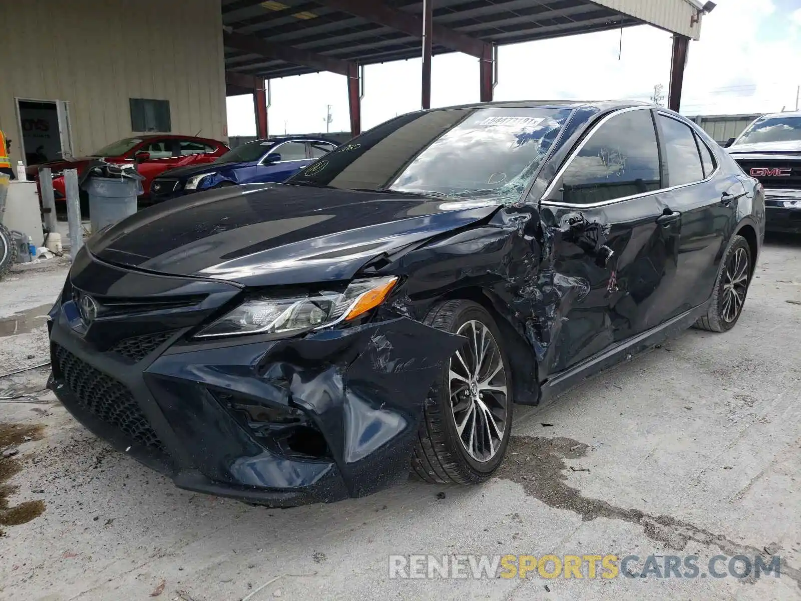 2 Photograph of a damaged car 4T1B11HK1KU681794 TOYOTA CAMRY 2019