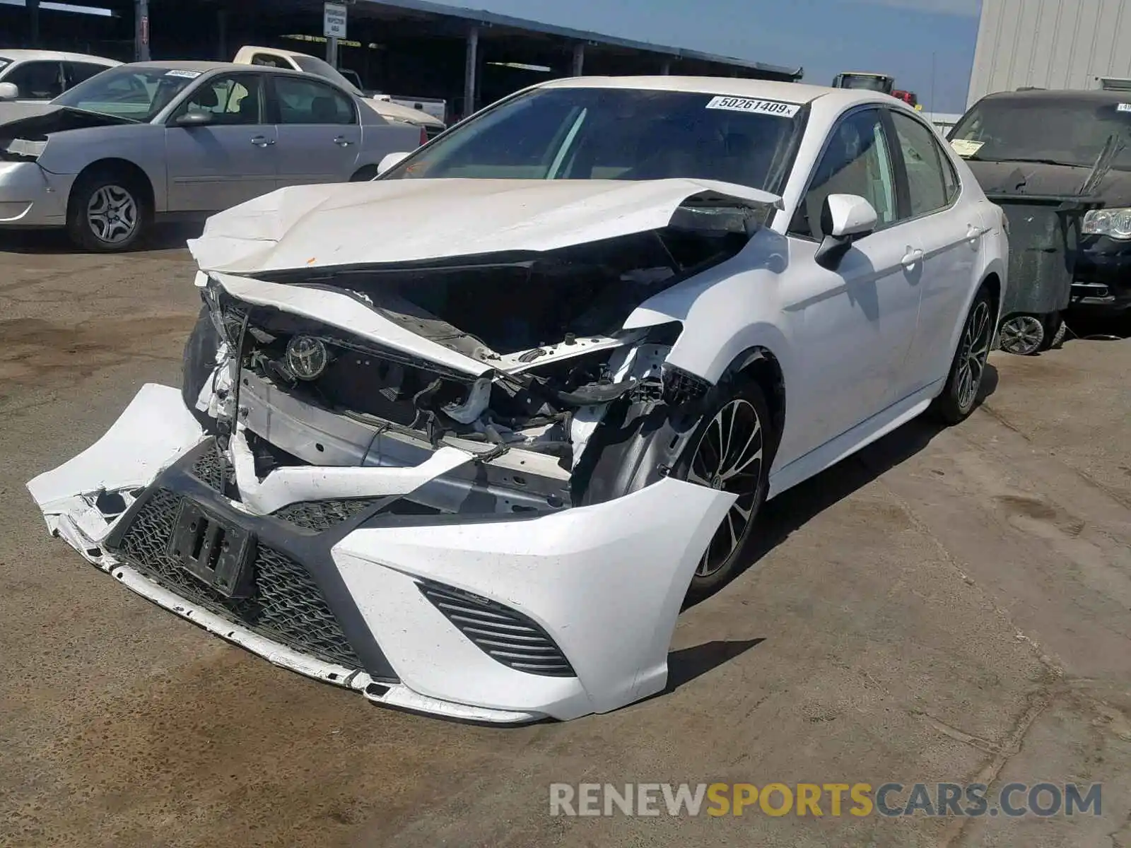 2 Photograph of a damaged car 4T1B11HK1KU682895 TOYOTA CAMRY 2019