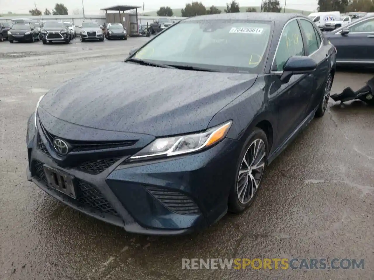 2 Photograph of a damaged car 4T1B11HK1KU682945 TOYOTA CAMRY 2019