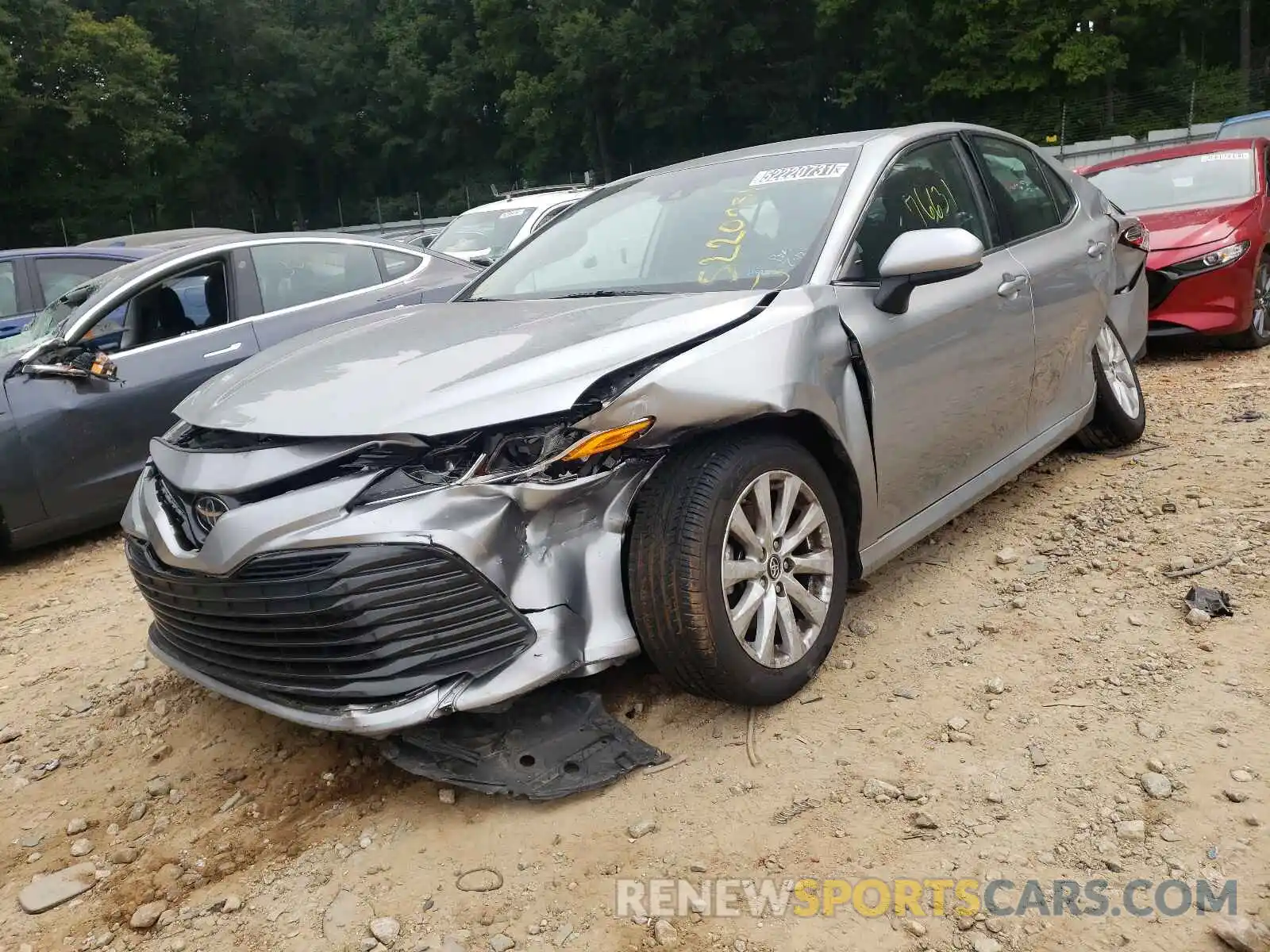 2 Photograph of a damaged car 4T1B11HK1KU685215 TOYOTA CAMRY 2019