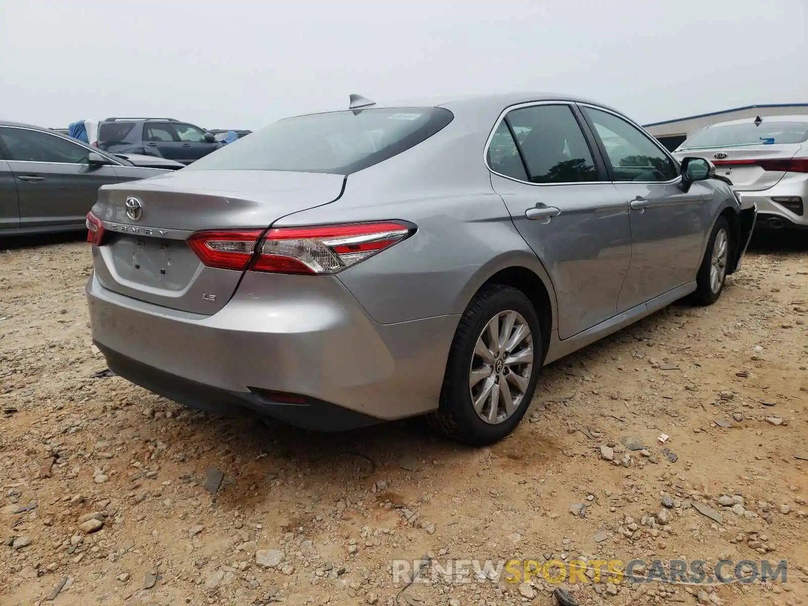 4 Photograph of a damaged car 4T1B11HK1KU685215 TOYOTA CAMRY 2019