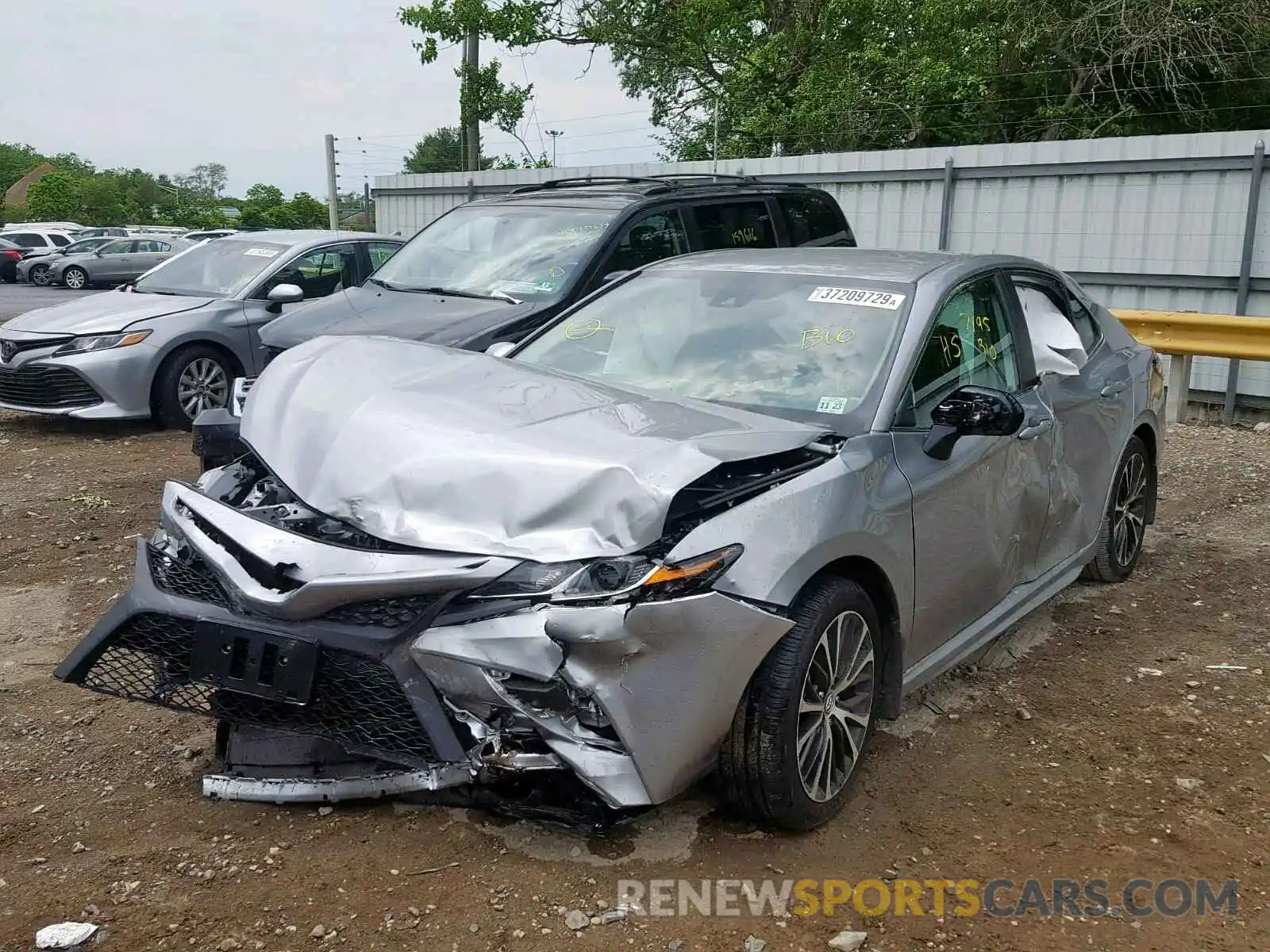 2 Photograph of a damaged car 4T1B11HK1KU685392 TOYOTA CAMRY 2019