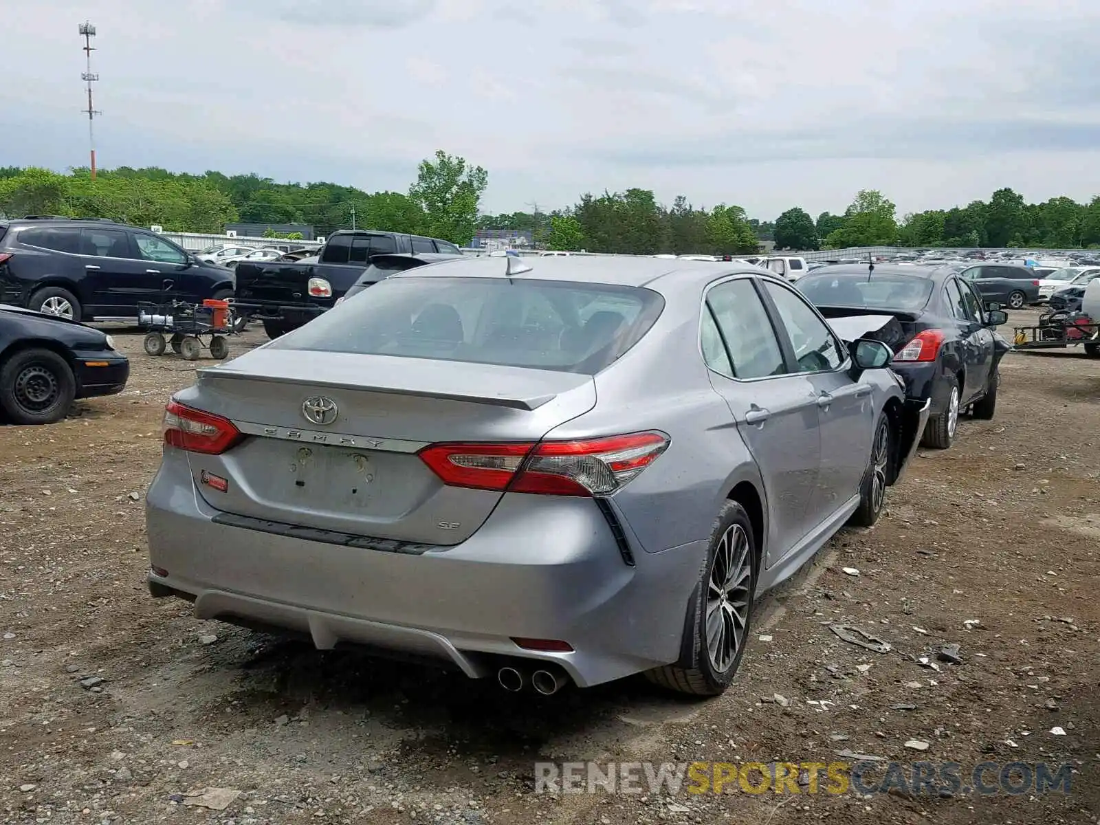 4 Photograph of a damaged car 4T1B11HK1KU685392 TOYOTA CAMRY 2019