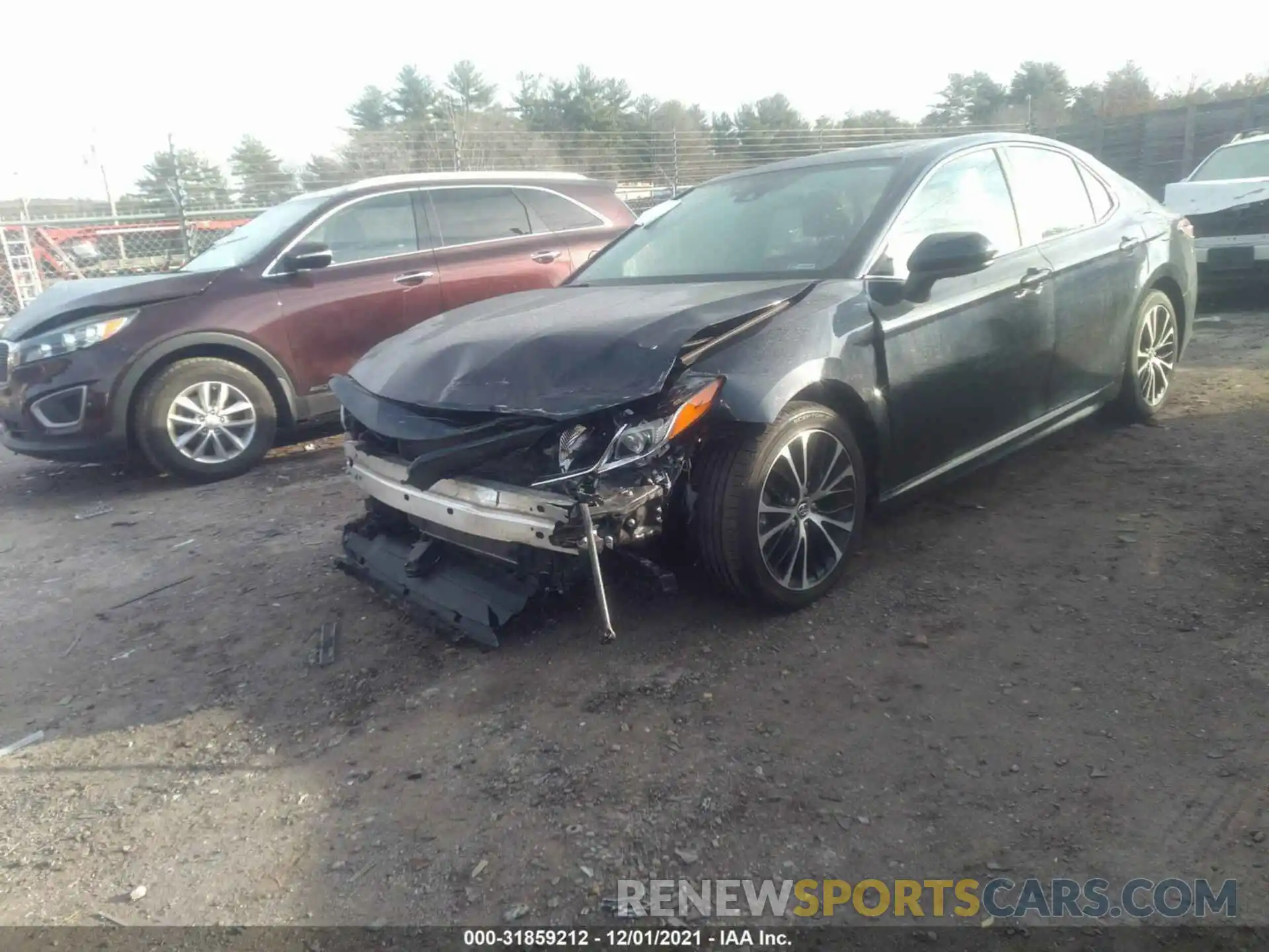 2 Photograph of a damaged car 4T1B11HK1KU686946 TOYOTA CAMRY 2019