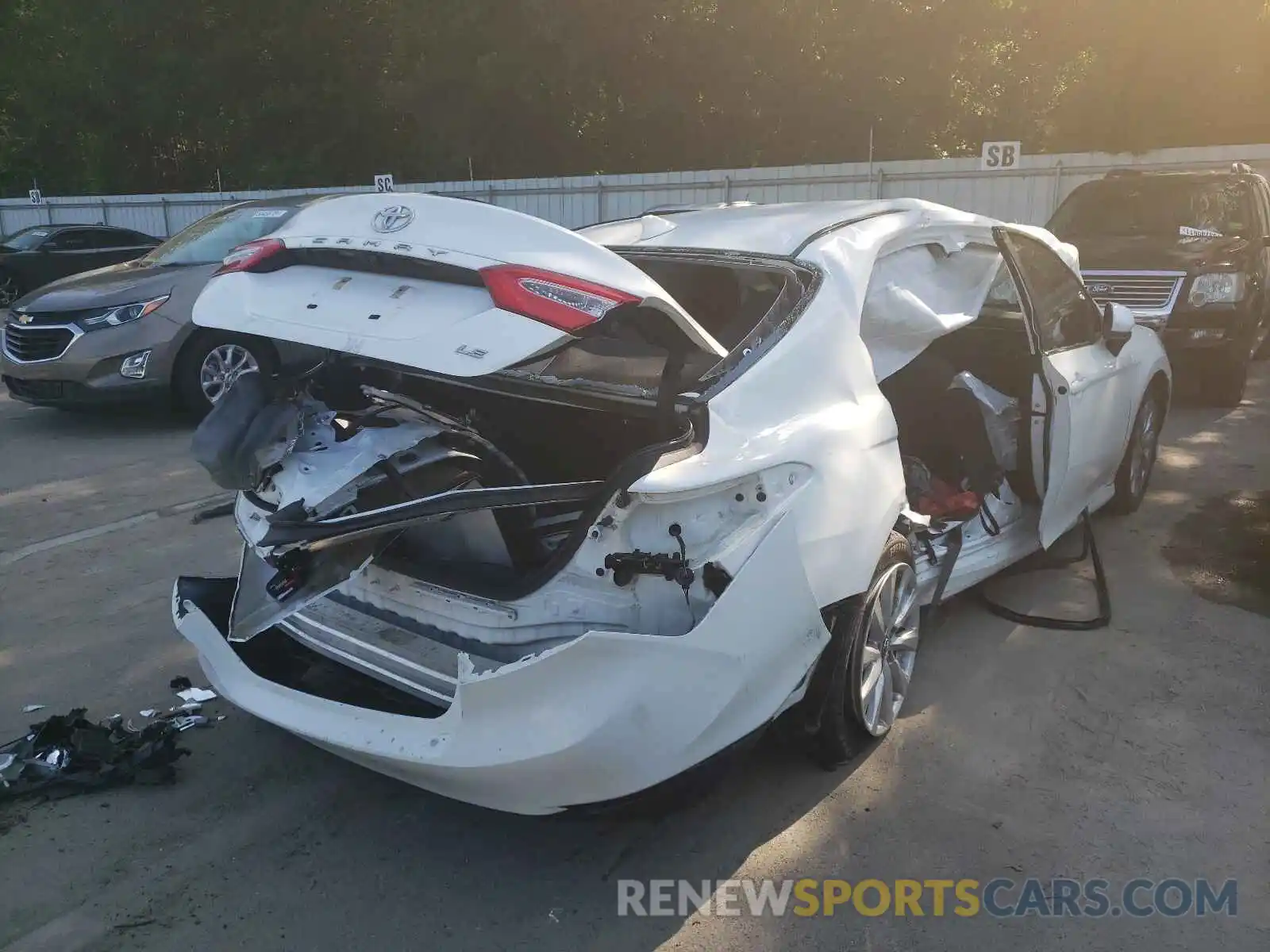 4 Photograph of a damaged car 4T1B11HK1KU691841 TOYOTA CAMRY 2019