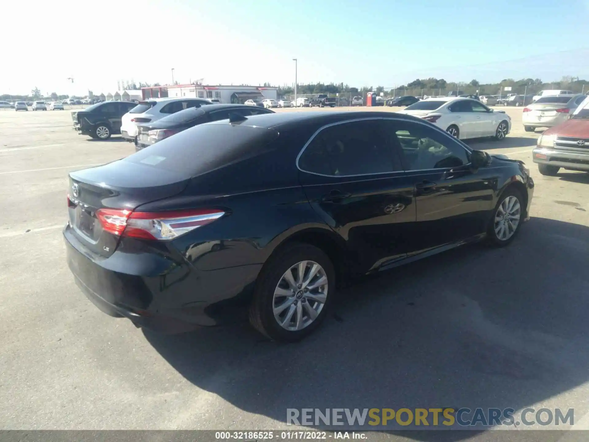 4 Photograph of a damaged car 4T1B11HK1KU692584 TOYOTA CAMRY 2019