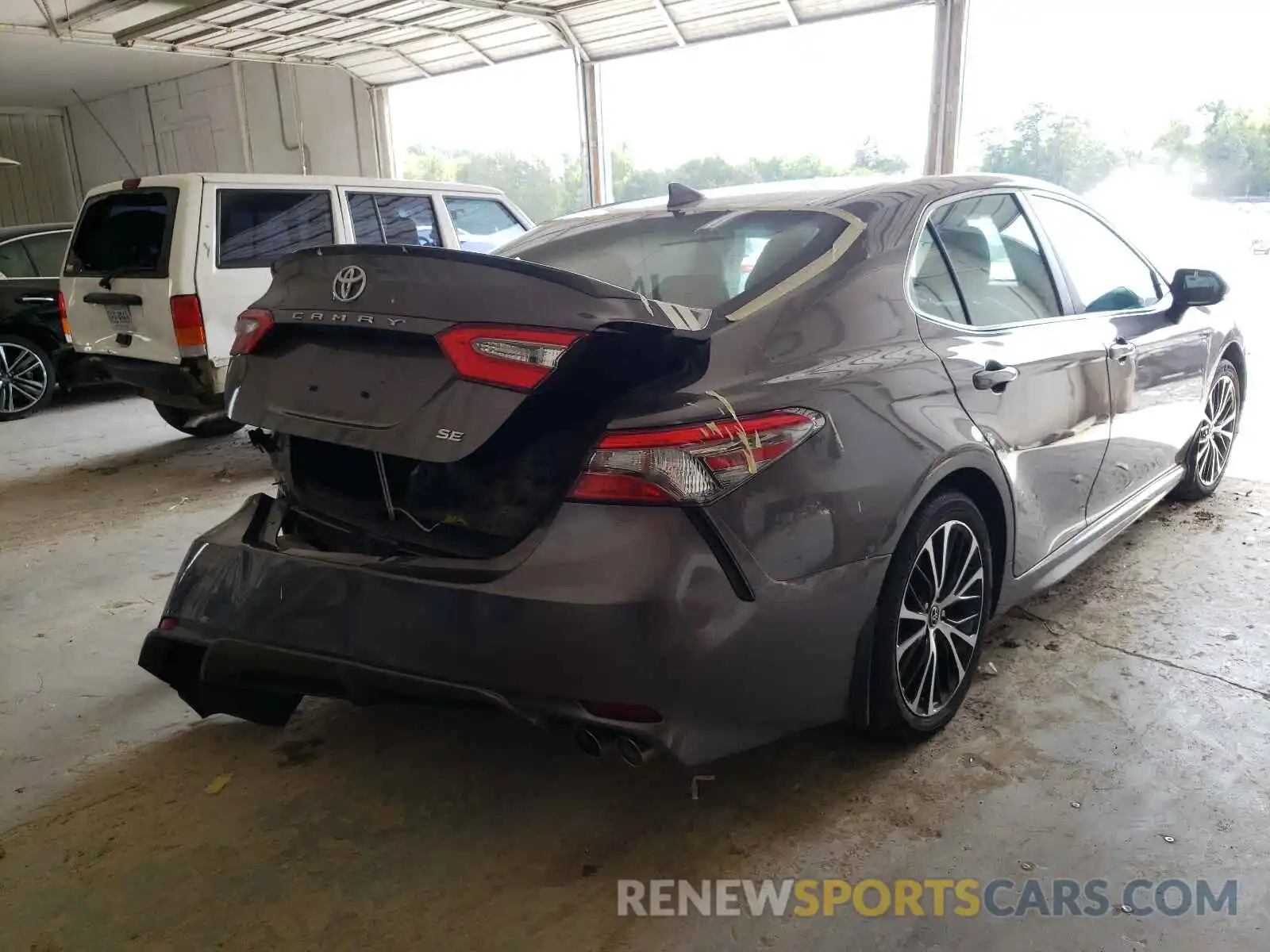 4 Photograph of a damaged car 4T1B11HK1KU693315 TOYOTA CAMRY 2019