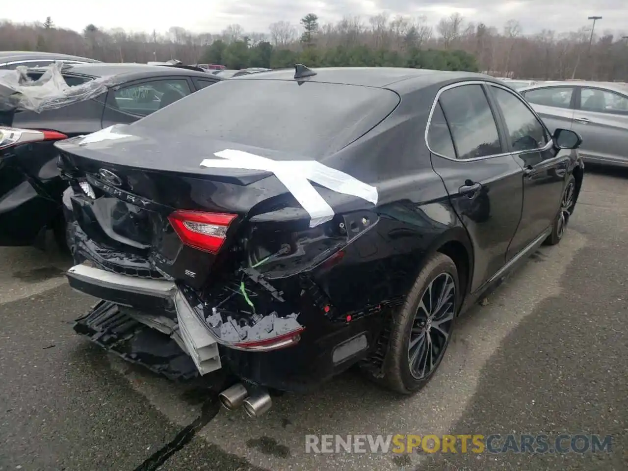 4 Photograph of a damaged car 4T1B11HK1KU694531 TOYOTA CAMRY 2019