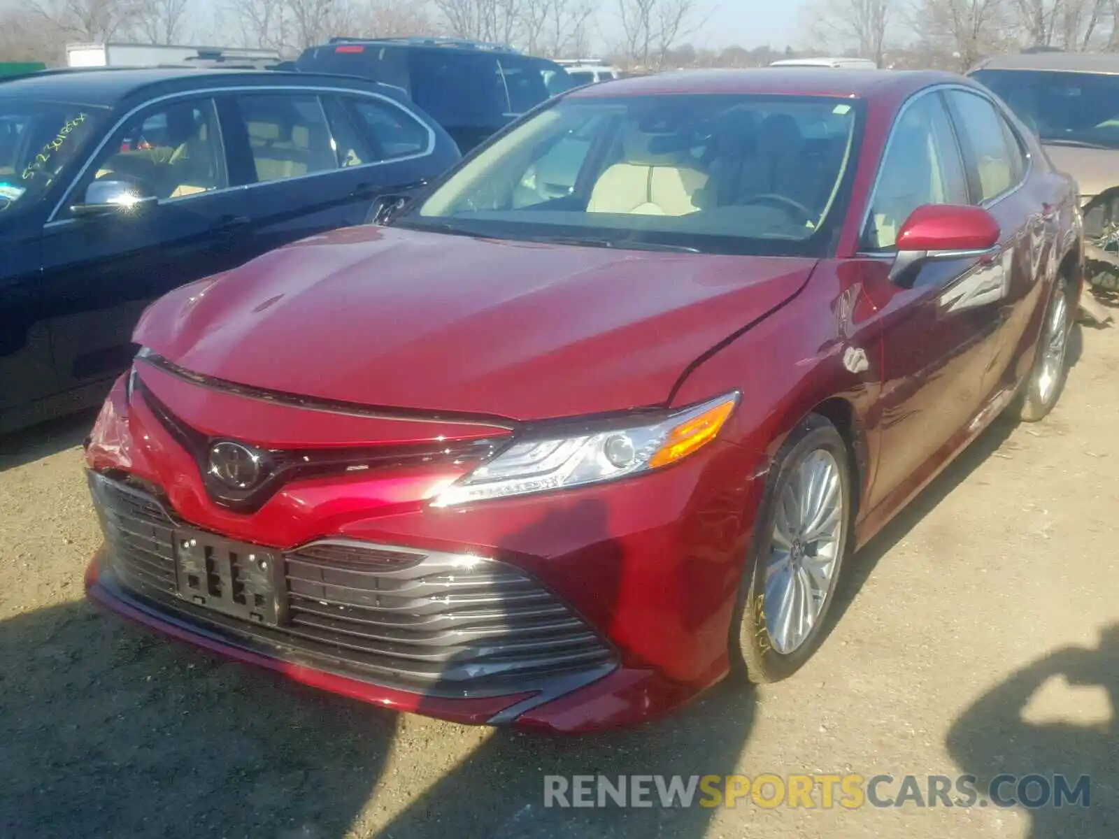 2 Photograph of a damaged car 4T1B11HK1KU694870 TOYOTA CAMRY 2019