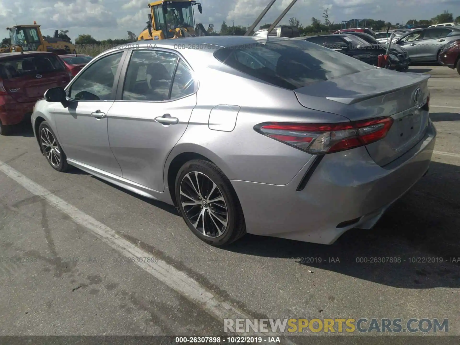 3 Photograph of a damaged car 4T1B11HK1KU696568 TOYOTA CAMRY 2019