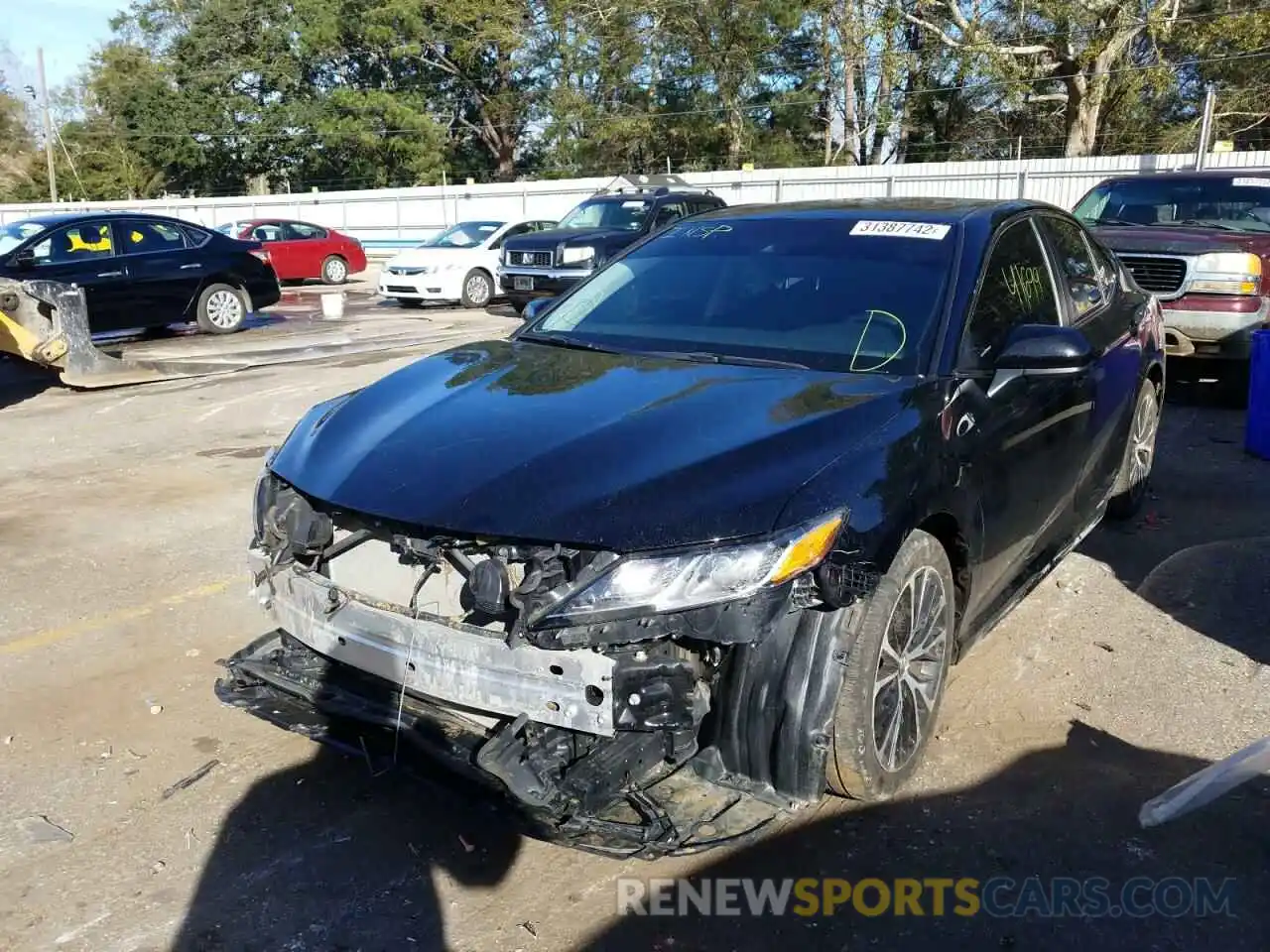 2 Photograph of a damaged car 4T1B11HK1KU697431 TOYOTA CAMRY 2019