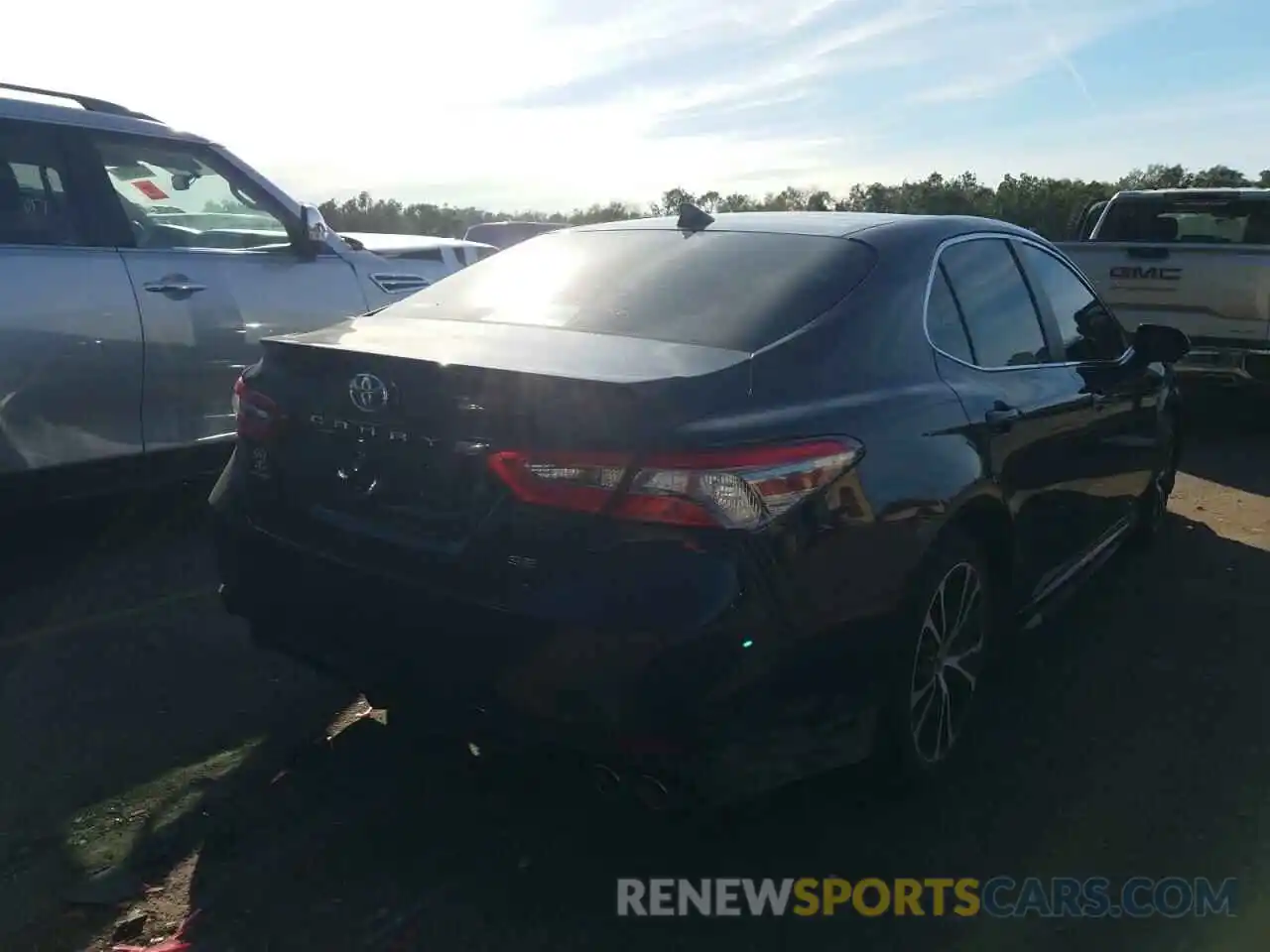 4 Photograph of a damaged car 4T1B11HK1KU697431 TOYOTA CAMRY 2019