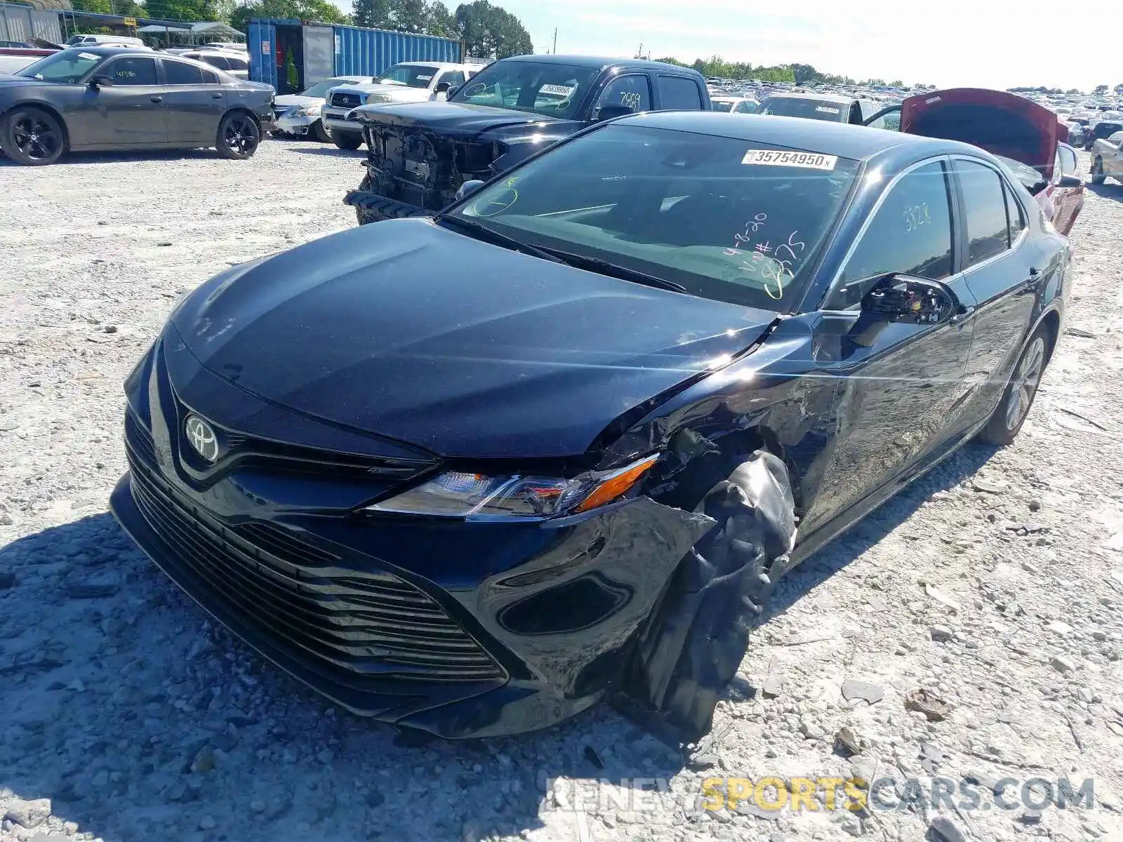 2 Photograph of a damaged car 4T1B11HK1KU699275 TOYOTA CAMRY 2019